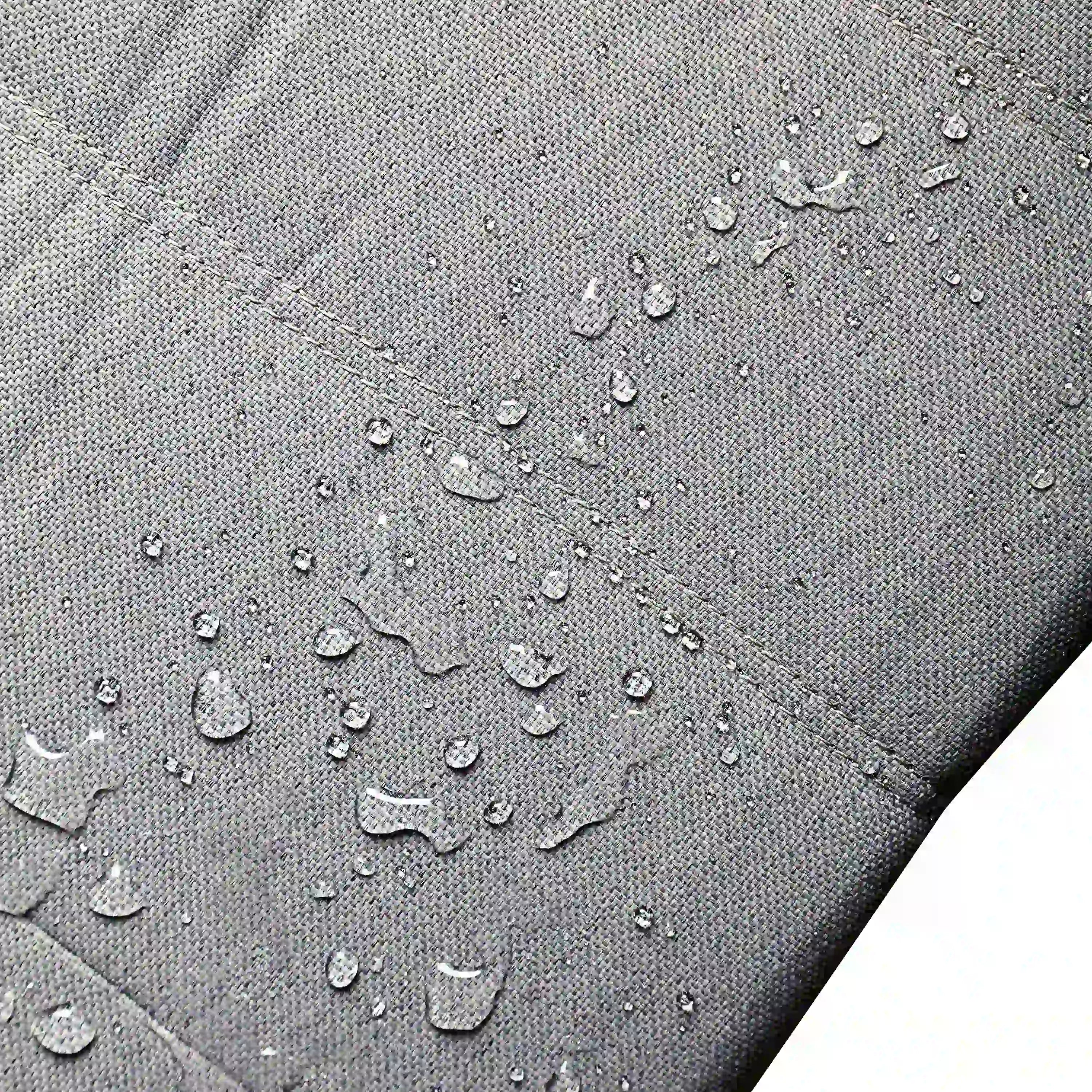 Water-beading on gray outdoor chair fabric surface for quick-drying protection