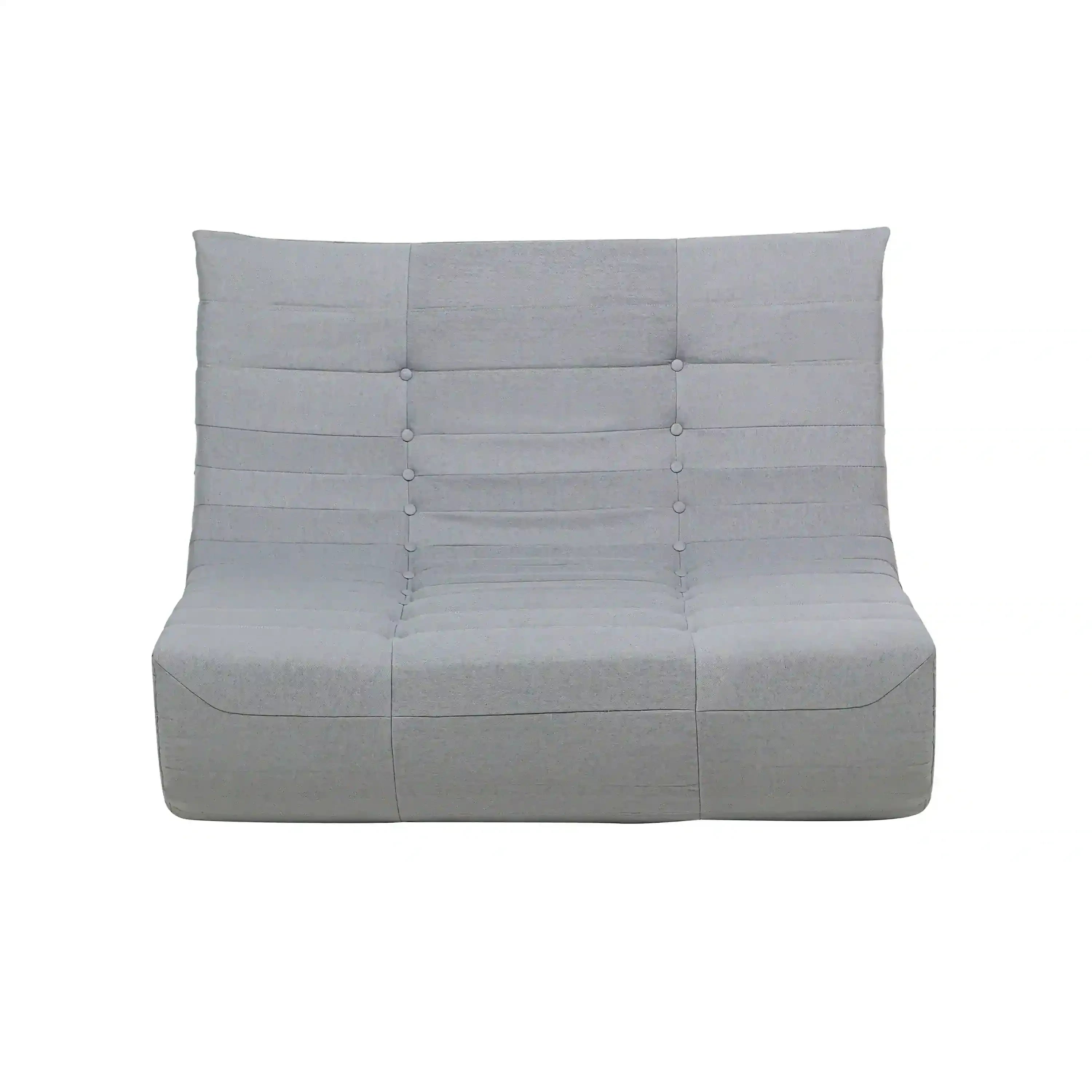 Gray outdoor compressed foam sofa front view with tufted button back and seat
