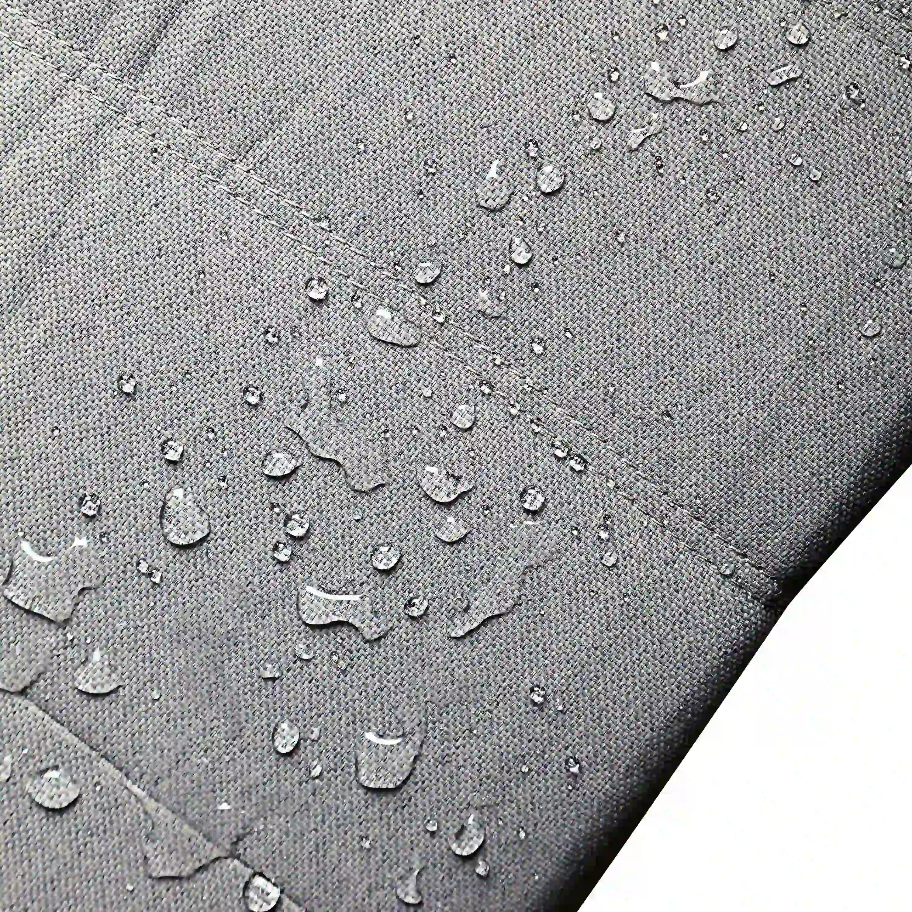 Gray woven upholstery fabric with water droplets for water-shedding coverage