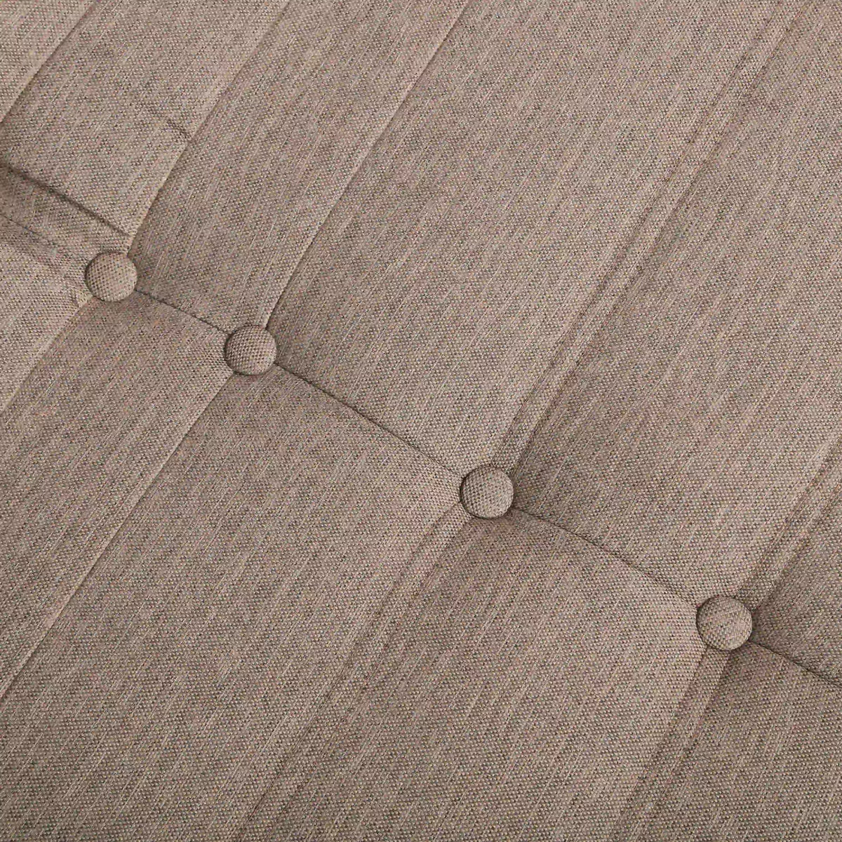 Light beige tufted seat with round button caps across the cushioned panels.