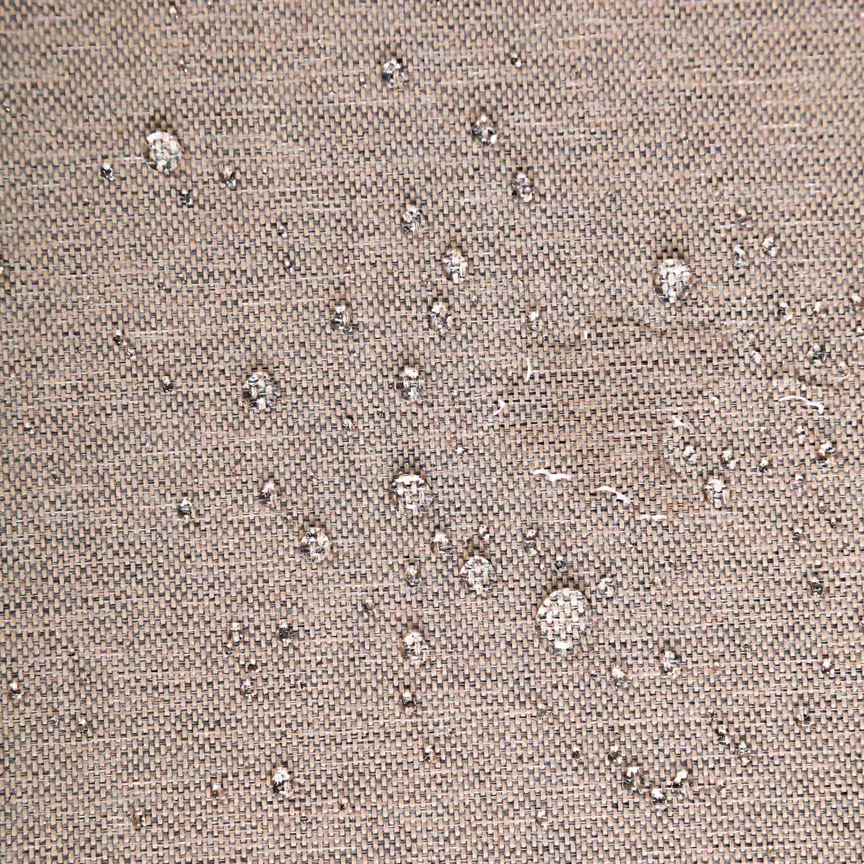 Brown textured outdoor fabric upholstery swatch with fine woven pattern