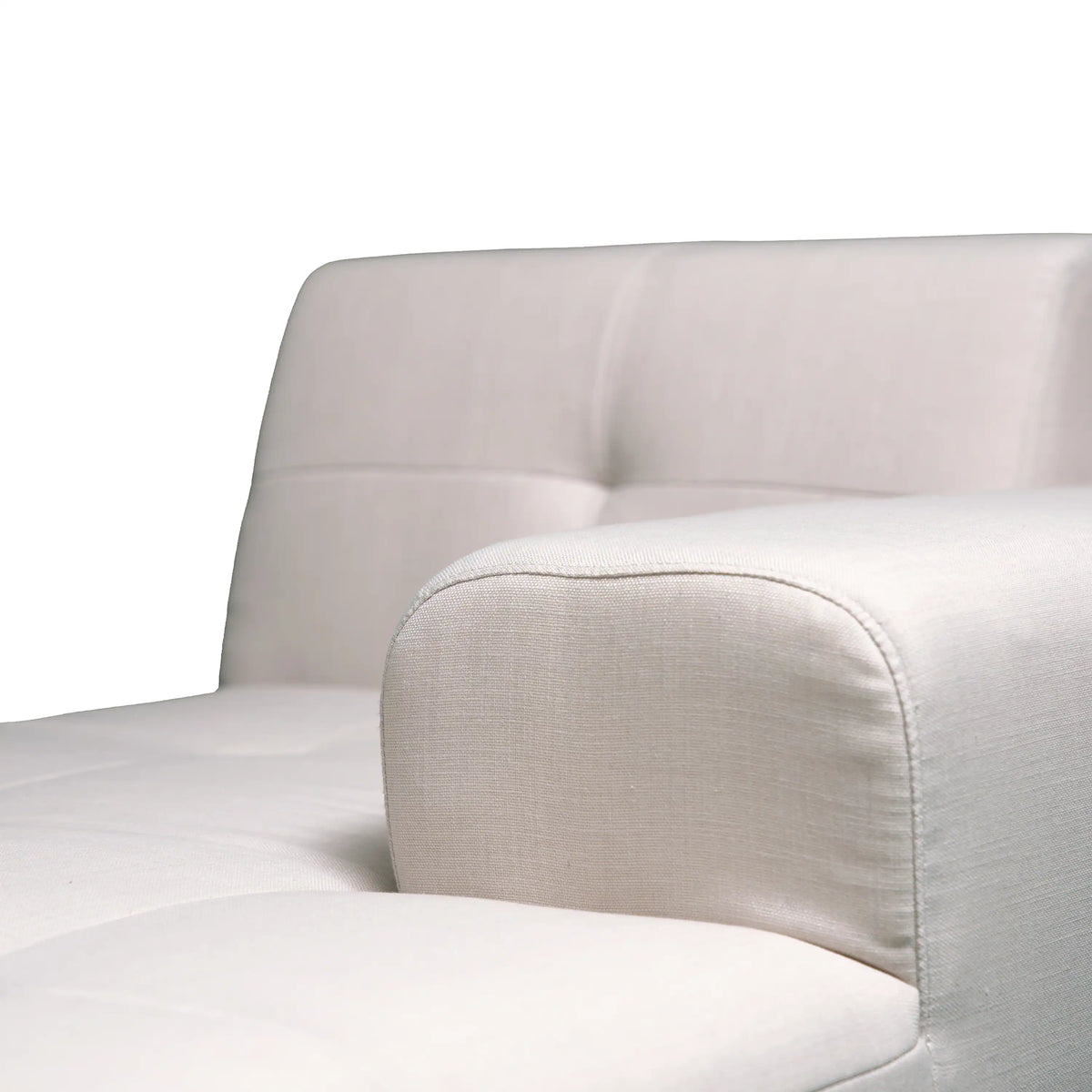 Beige sectional arm and seat cushion with curved corner stitching detail