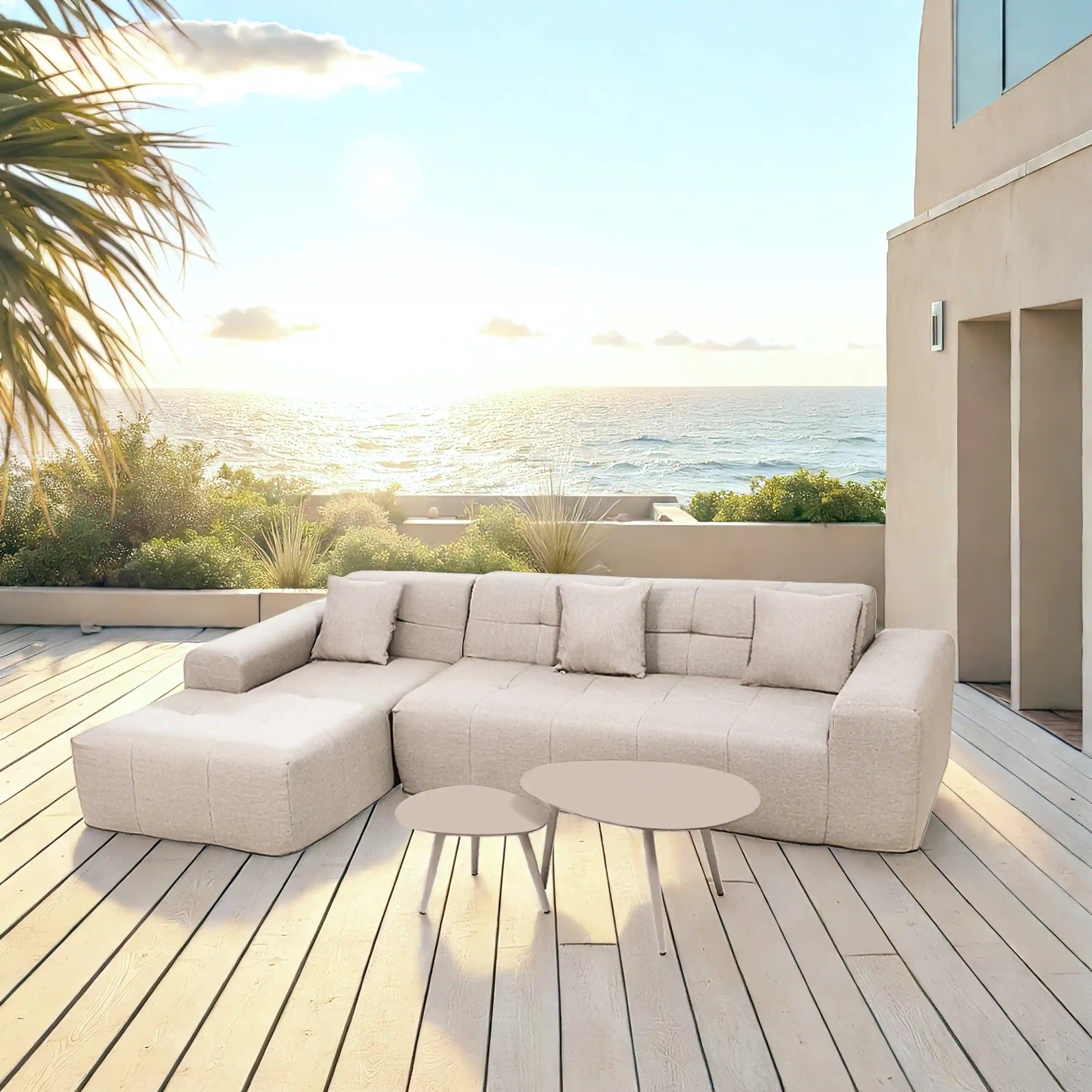 Beige outdoor sectional sofa with chaise seat cushions and back pillows