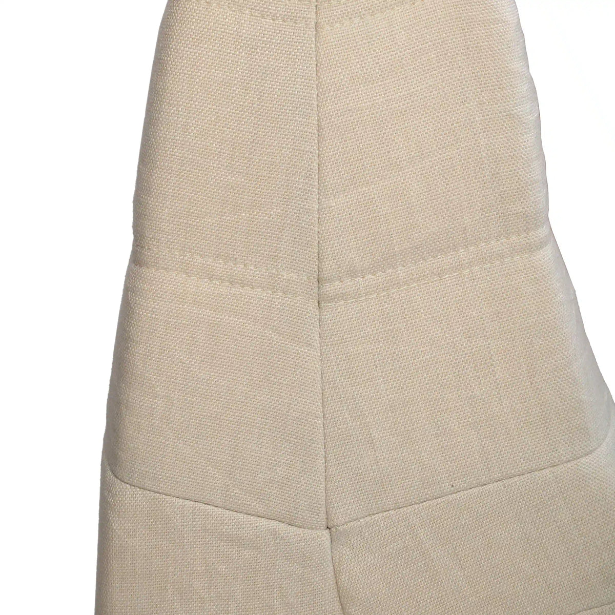 Beige textured outdoor foam sofa arm section with stitched seams and paneling