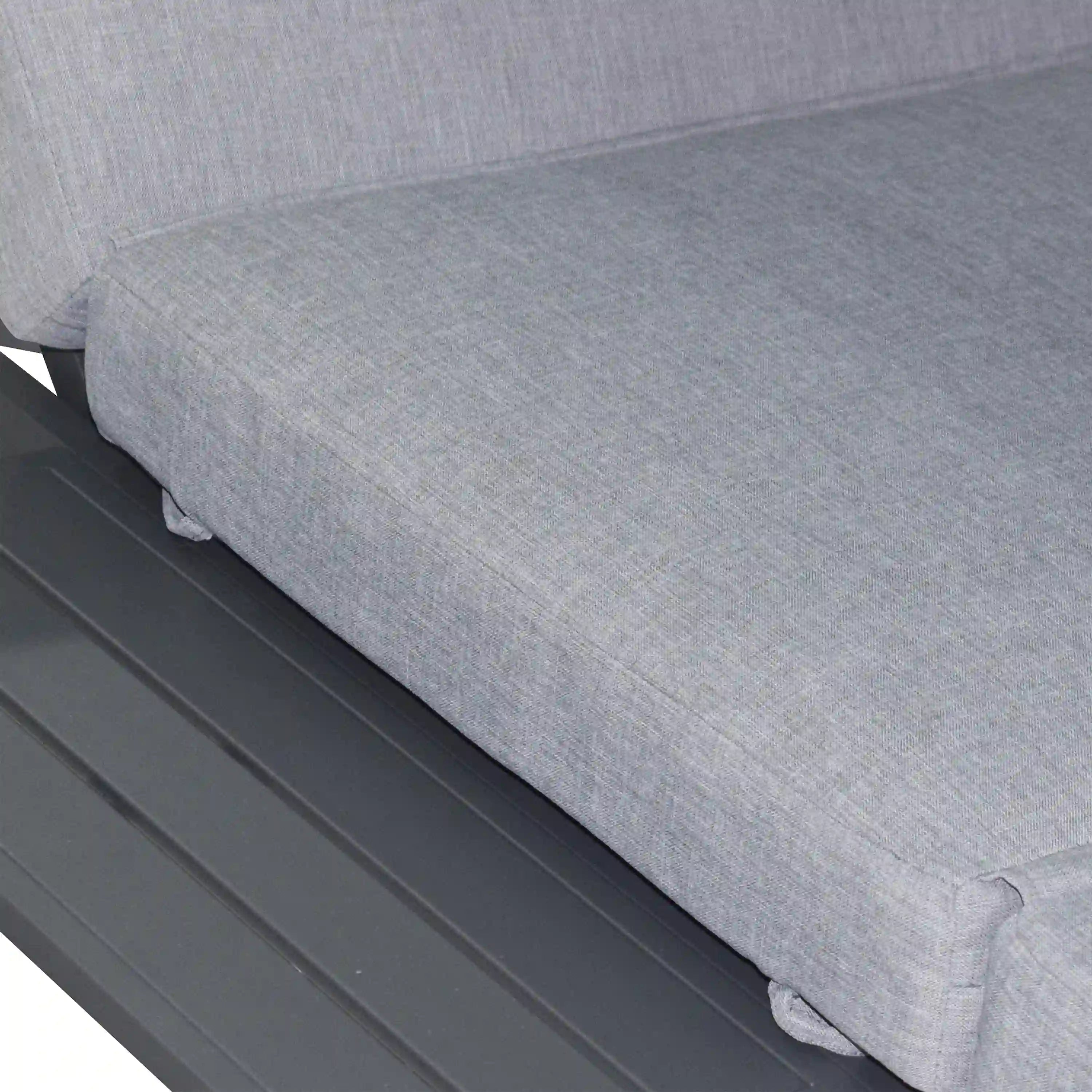 Gray outdoor patio daybed cushion on rectangular base with stitched fabric
