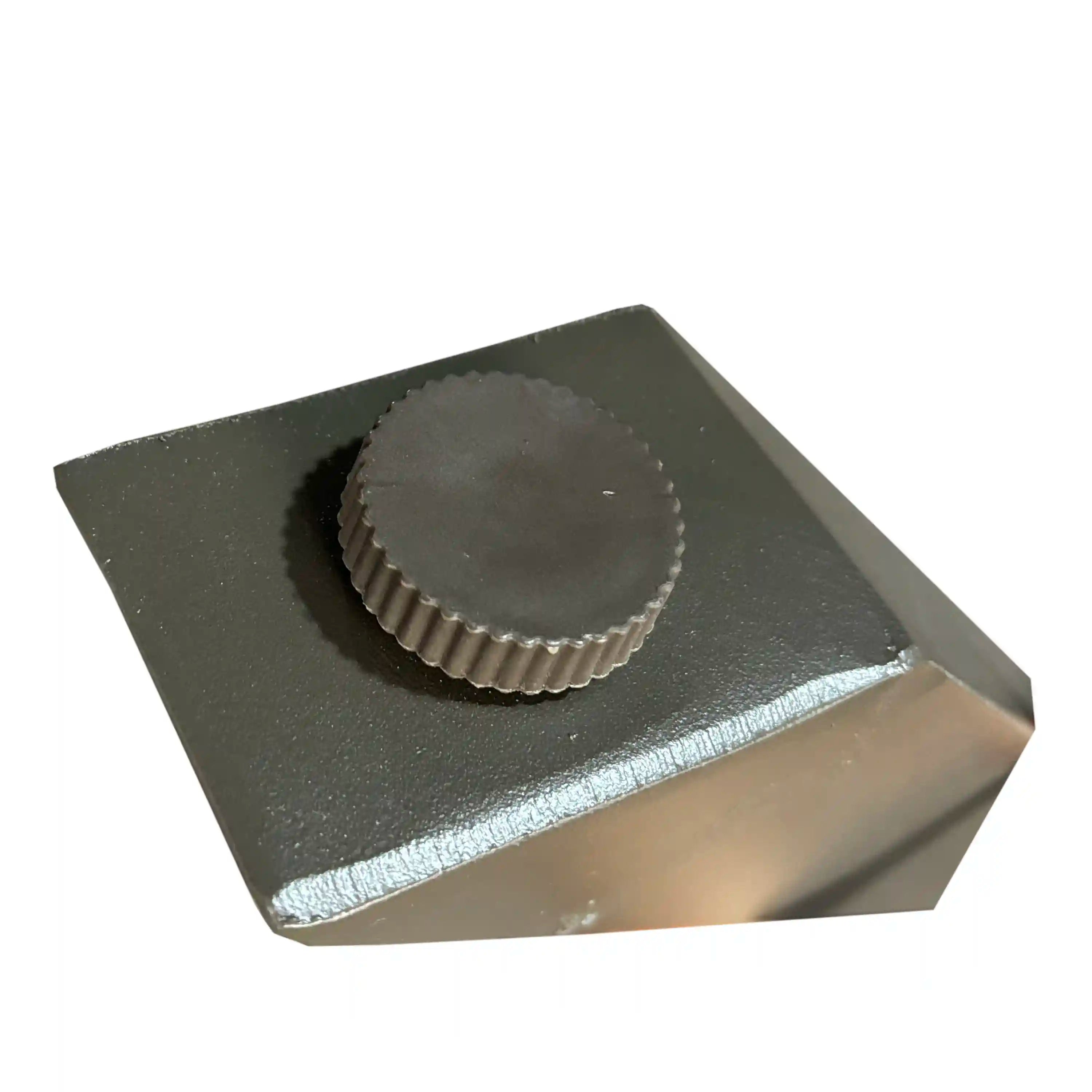 Metal table corner foot cap with rounded plate and dark bracket