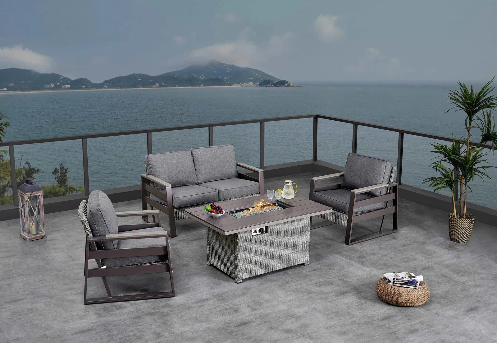 Outdoor patio seating set with armchairs and center firepit table with cushions
