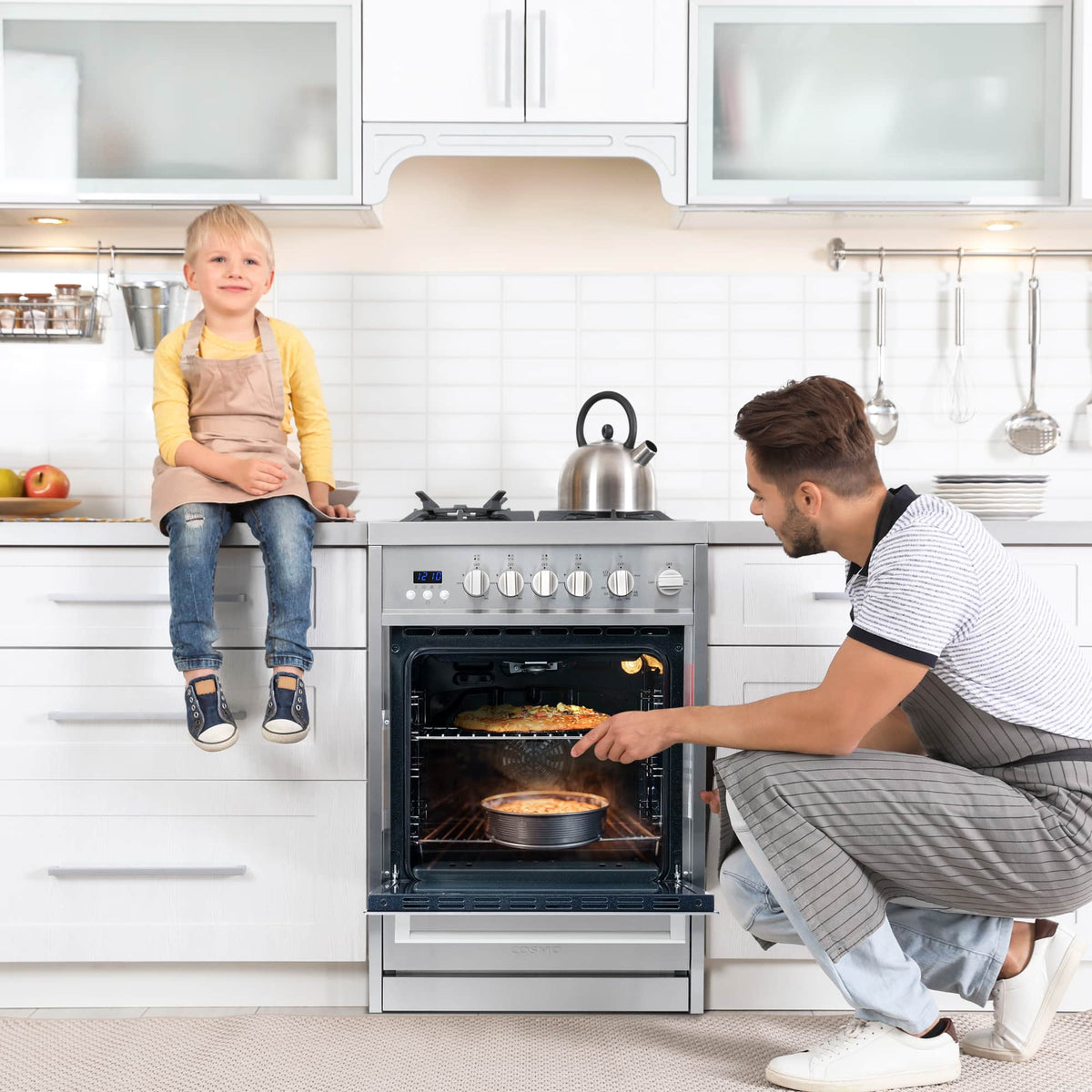 Stainless steel gas range with open oven door and four-burner cooktop