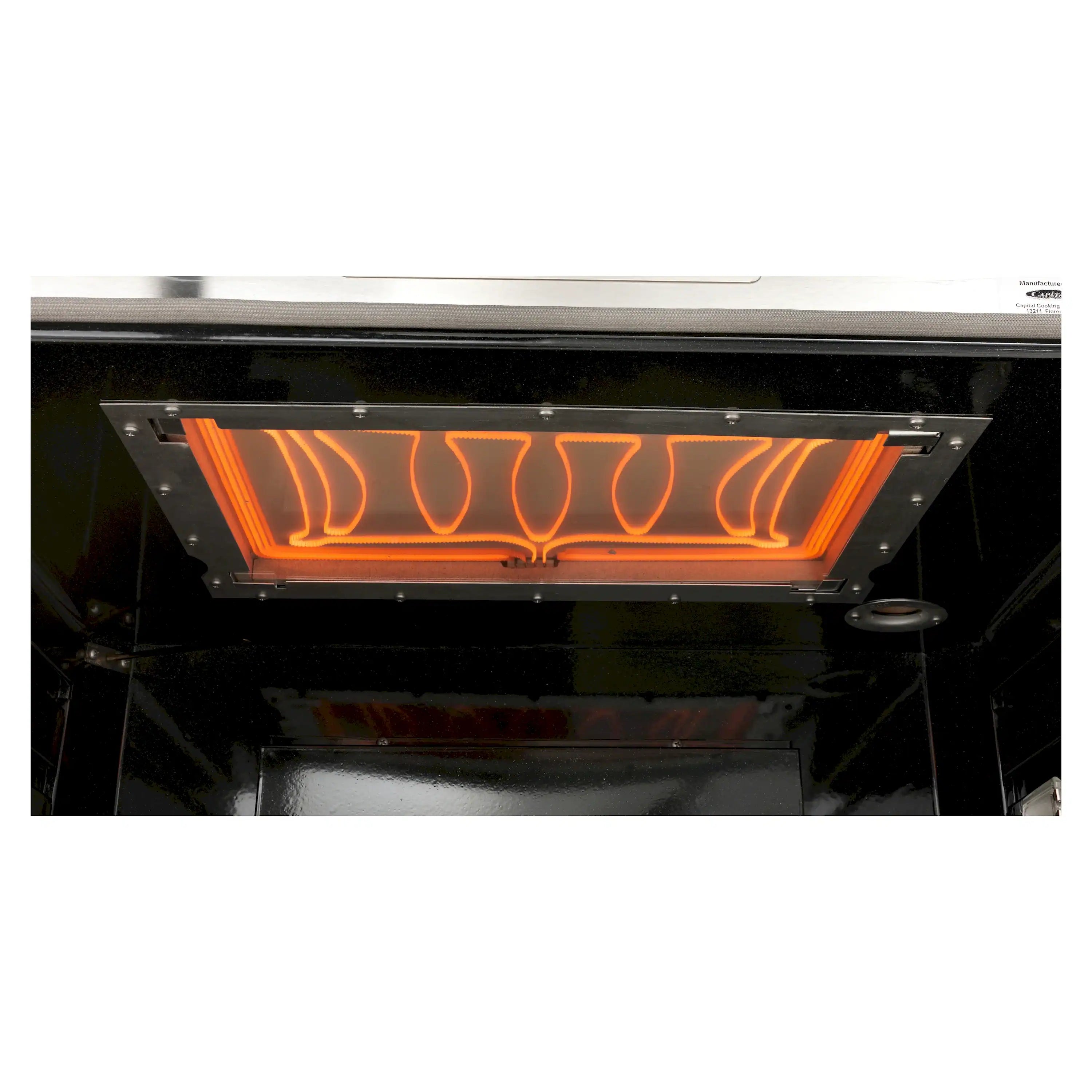 Gas oven broiler area with orange glowing heating element inside the open oven