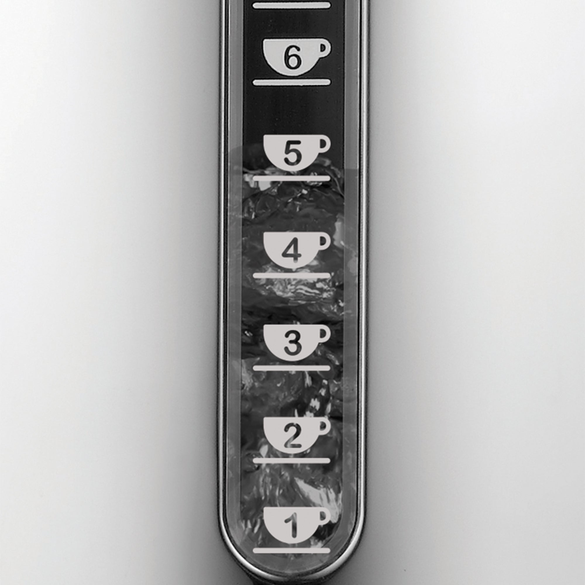Close-up of electric kettle’s water level window with numbered markings on black panel.