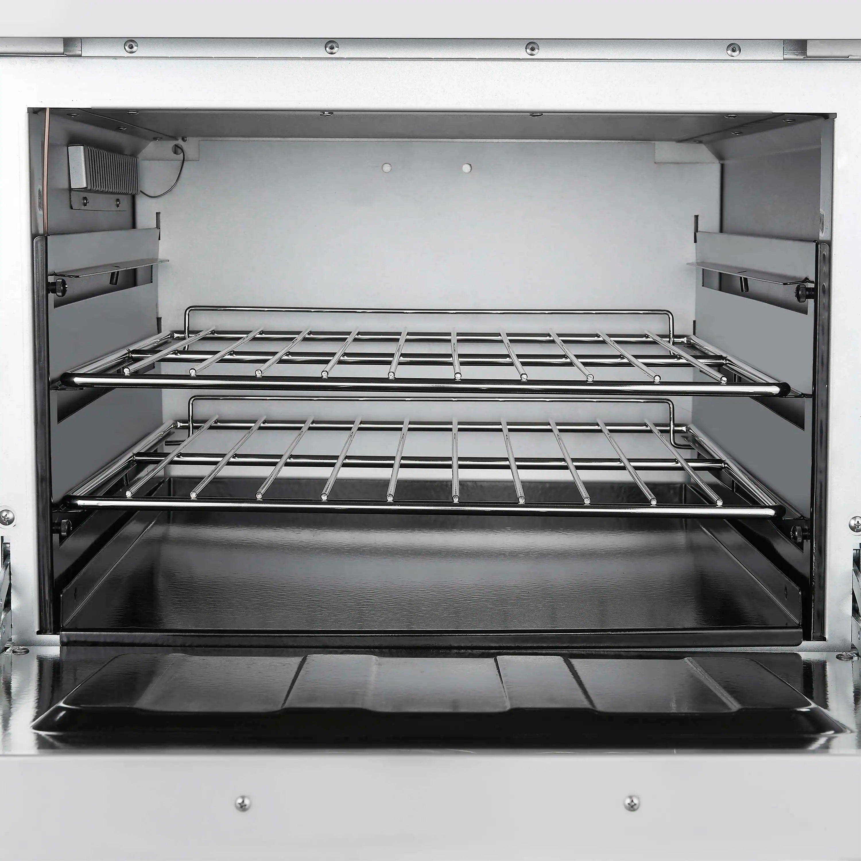 Open stainless oven with two wire racks inside the gas range