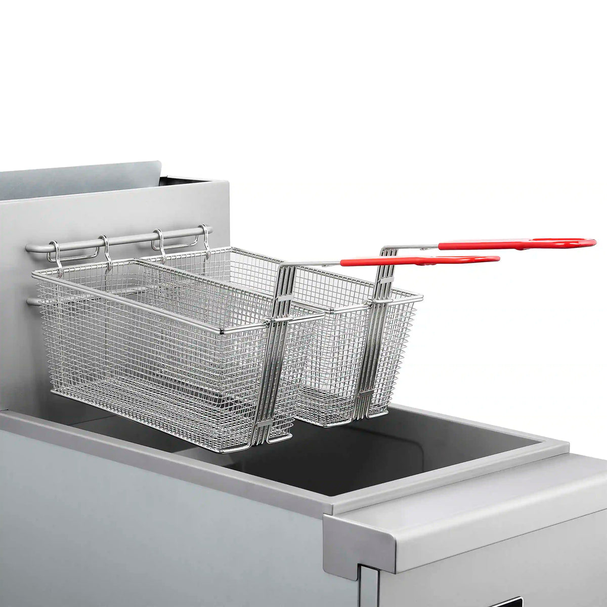 Stainless steel deep fryer top view with two wire baskets and red handles over tank