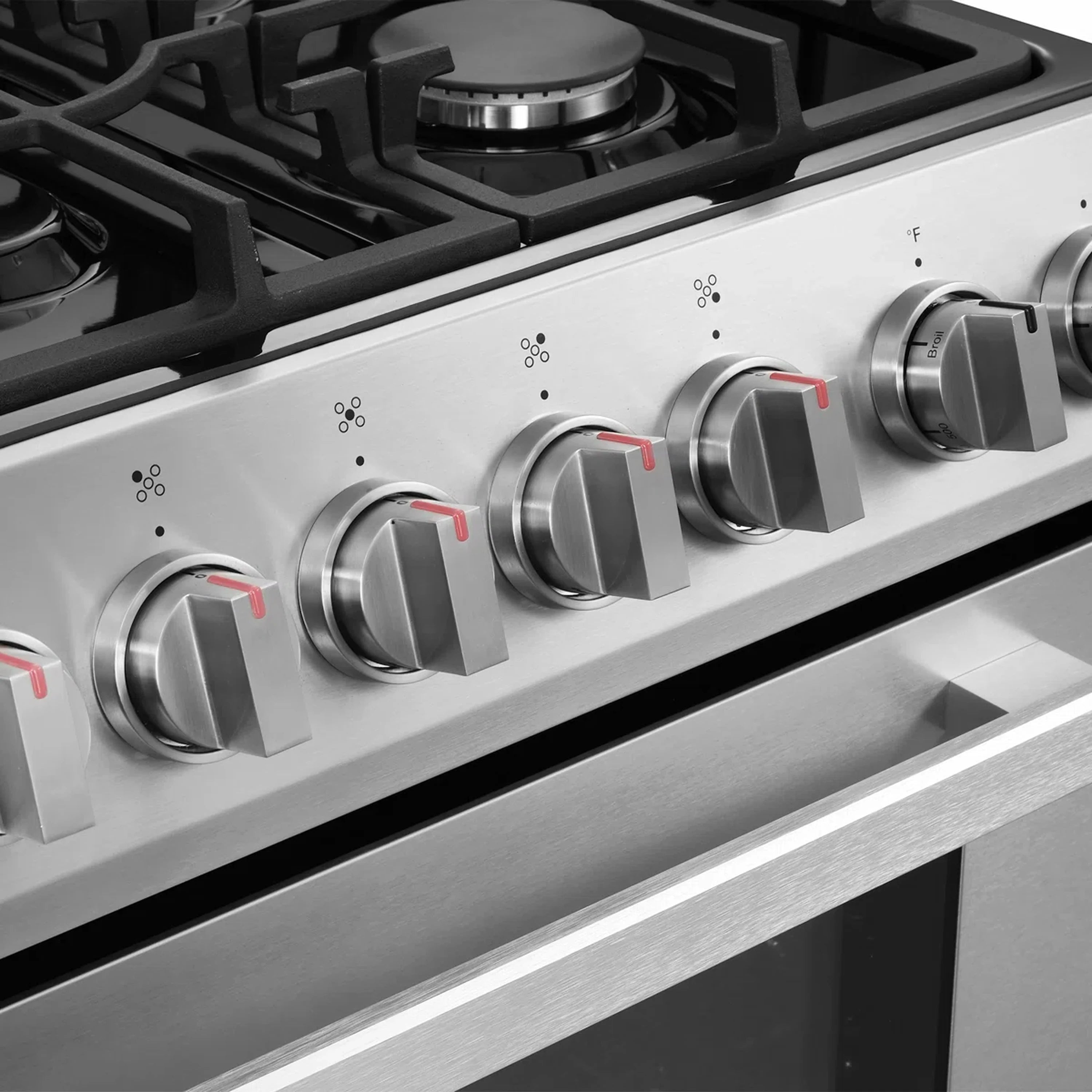 Stainless steel gas range with 5 burner control knobs along the cooktop