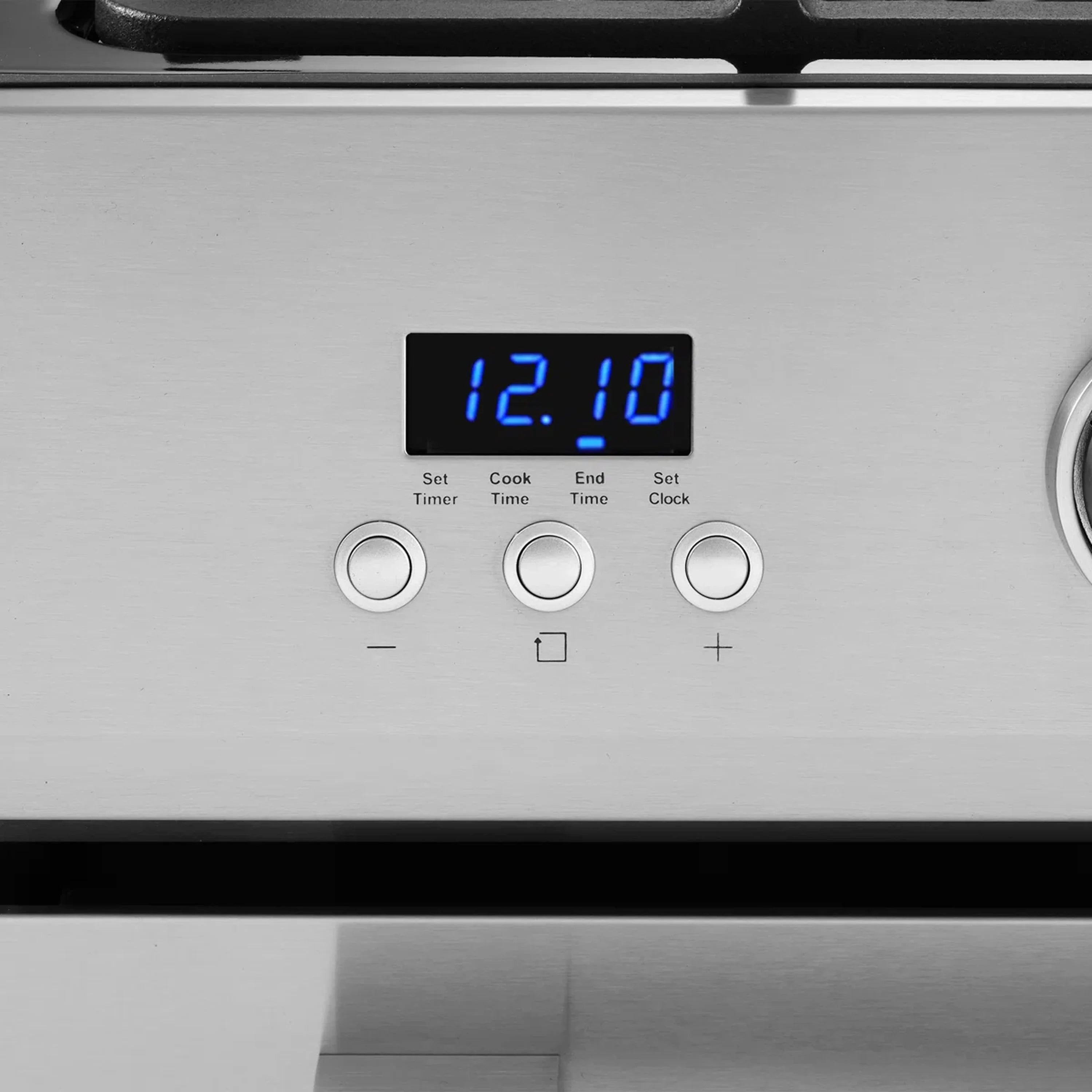 Stainless steel gas range control panel with digital clock and three round buttons