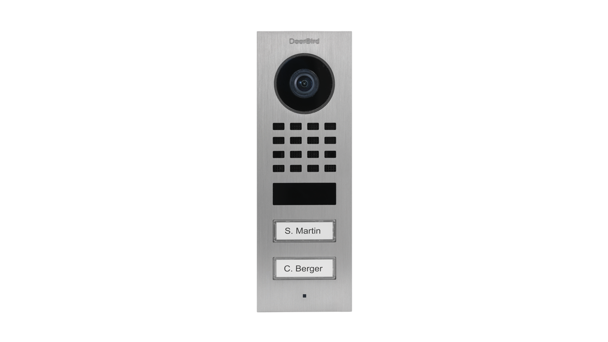 DoorBird video door station, pure white front with camera lens and nameplate buttons