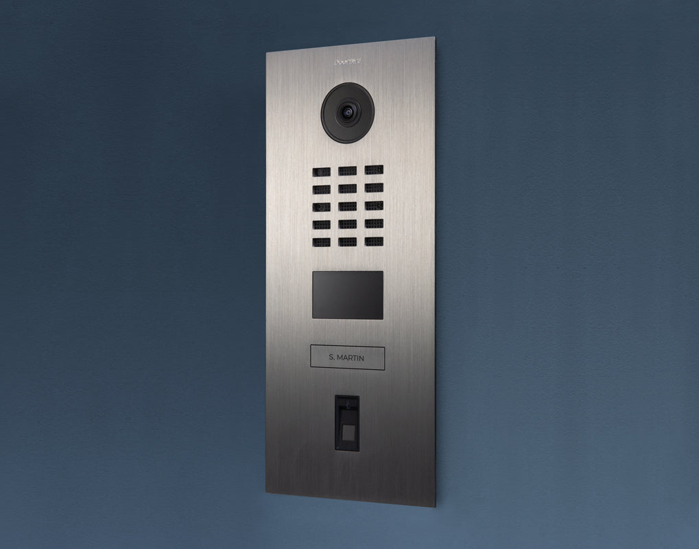 DoorBird stainless video door station with camera, keypad grid, and doorbell button