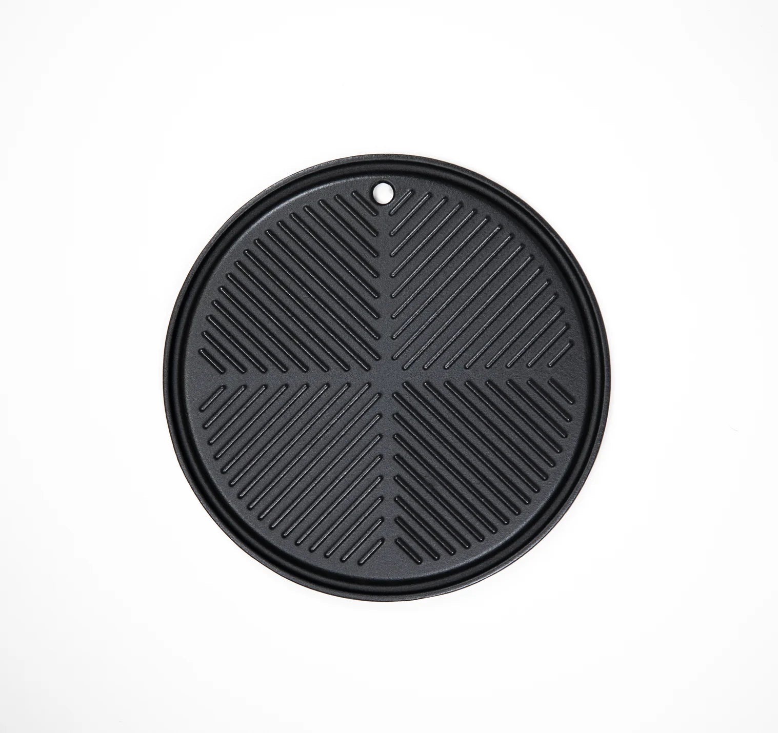 Round cast iron cooking plate with grill ridges, black finish, and center vent hole