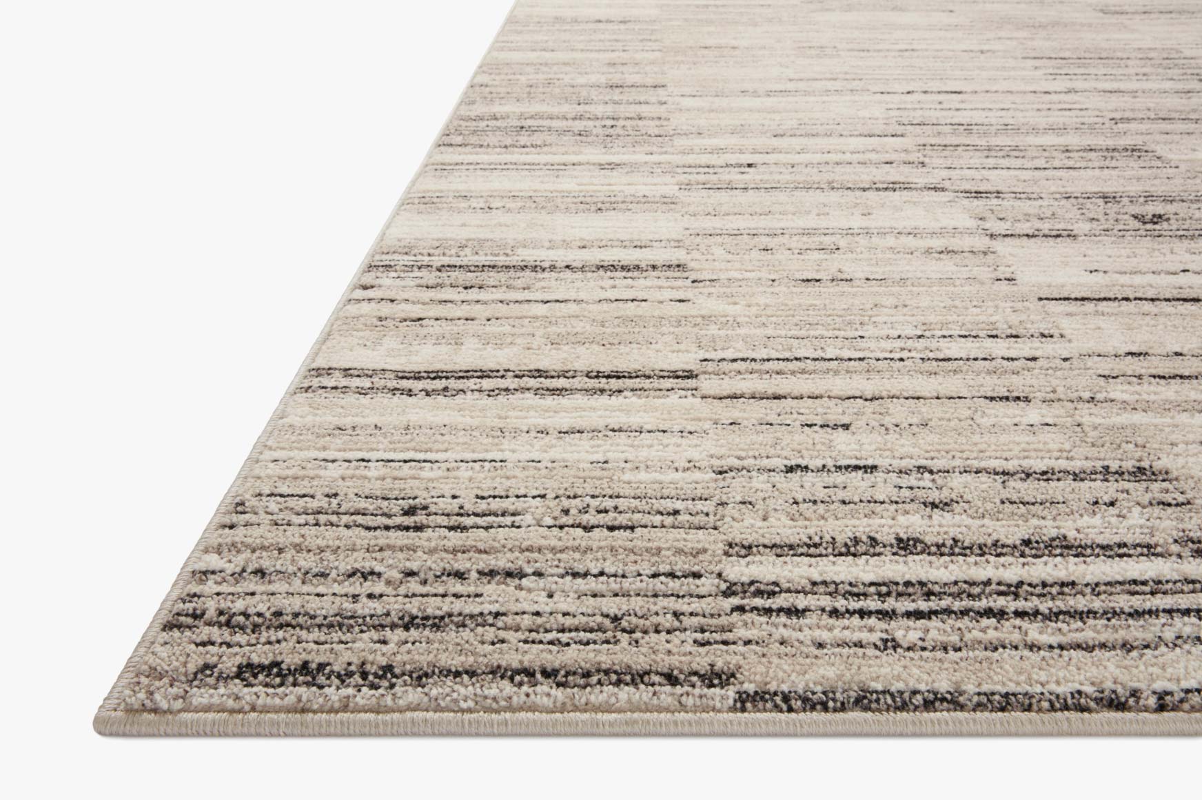 Charcoal and sand striped runner rug with textured, layered pattern and flat weave edge