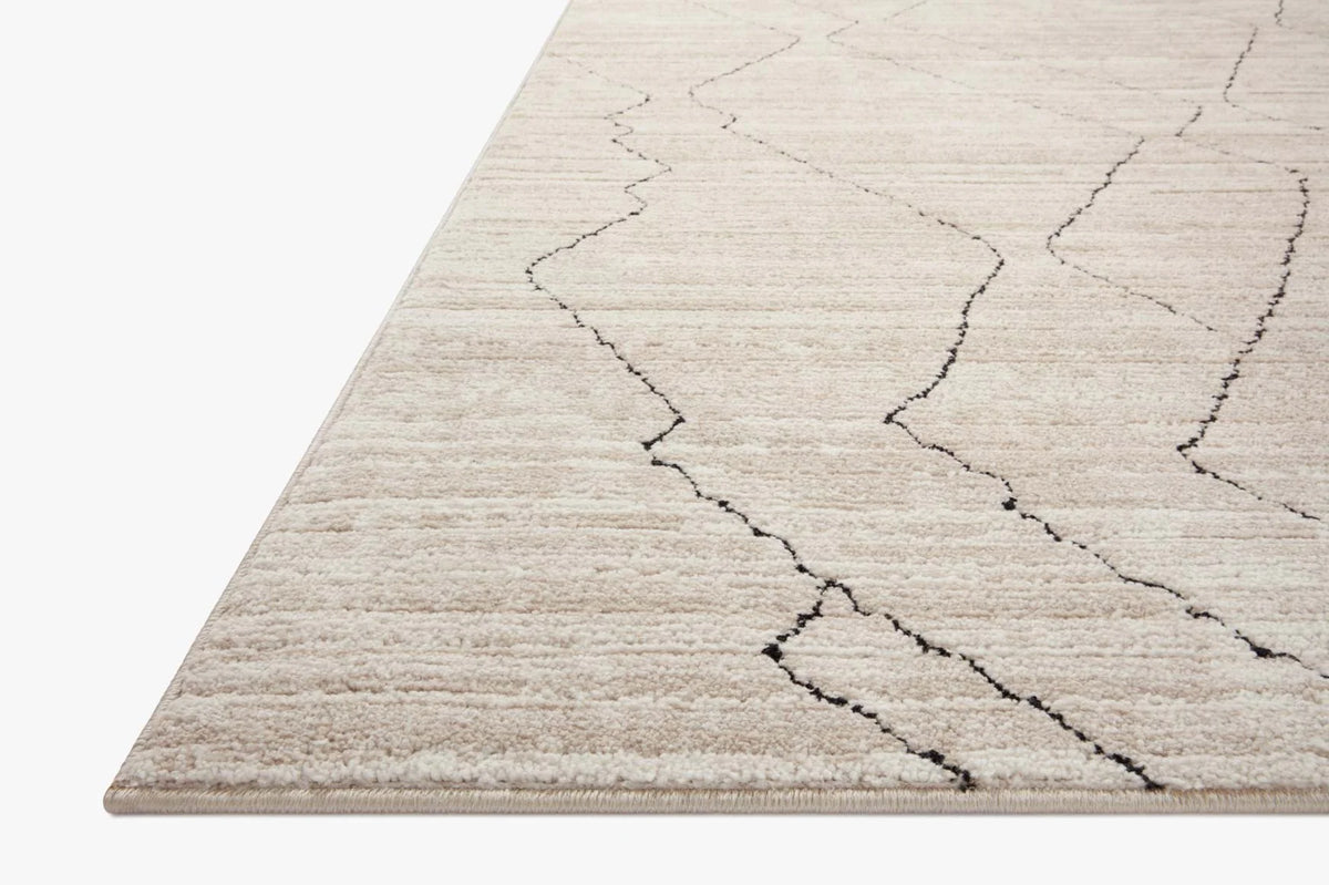 Sand runner rug with charcoal geometric line pattern and flatwoven texture