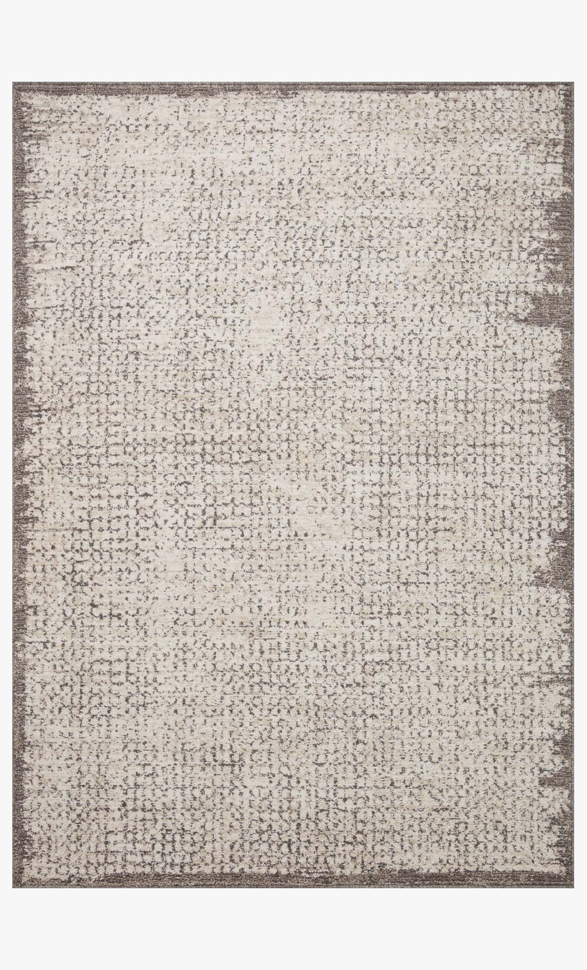 Ivory and stone accent rug with uniform speckled pattern and dark square border