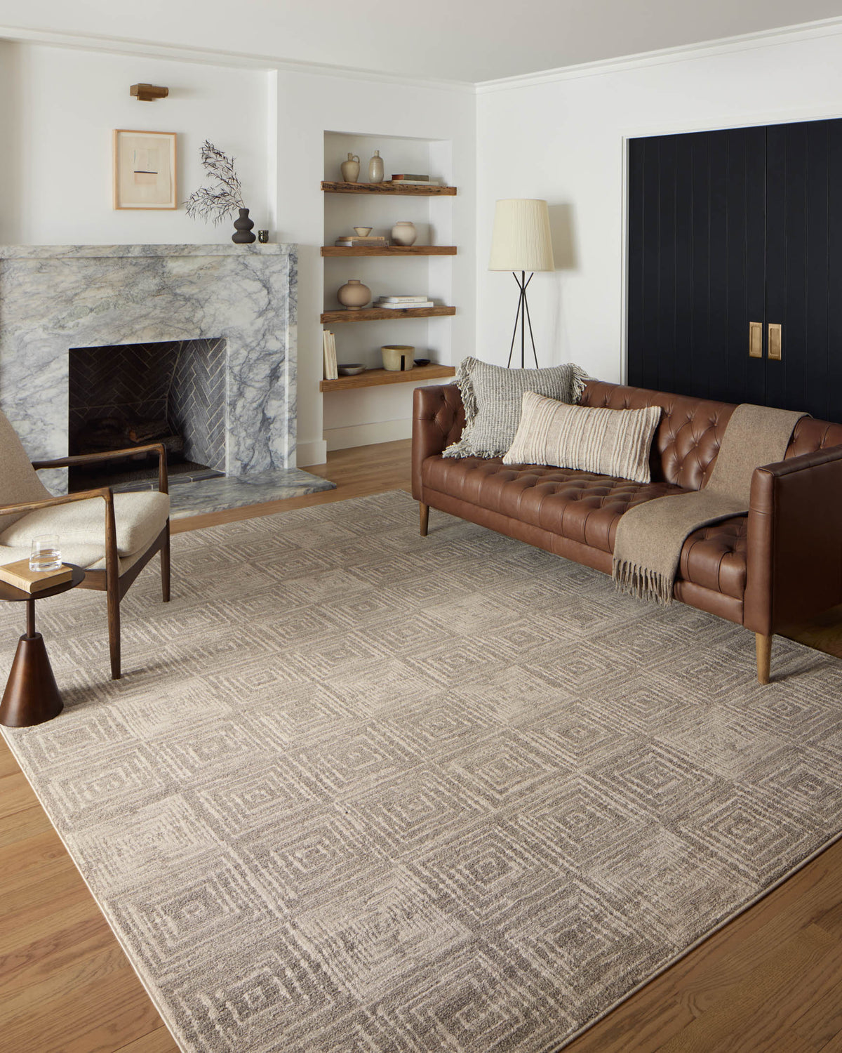 Beige and gray geometric runner rug with textured weave, laid flat on hardwood floor