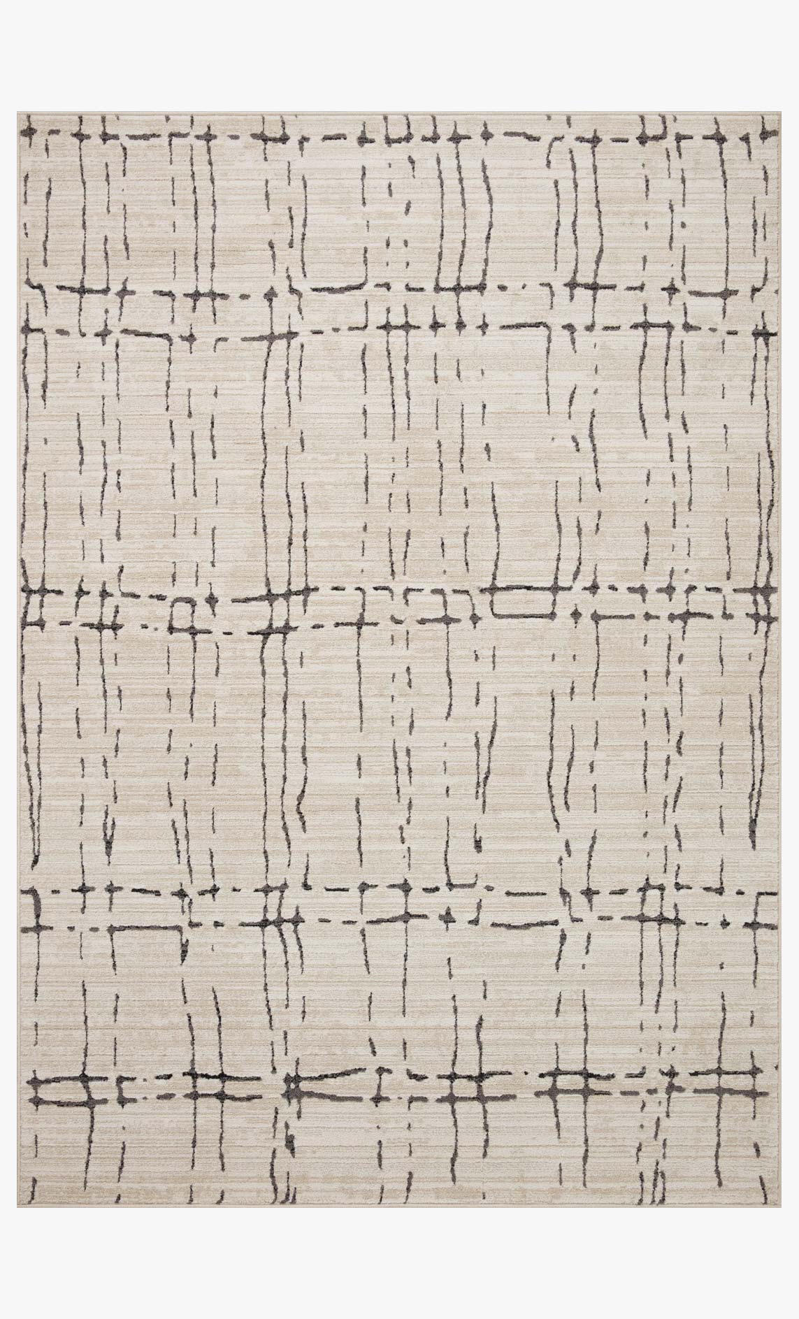 Sand and dark gray area rug with full-face abstract grid of intersecting lines.
