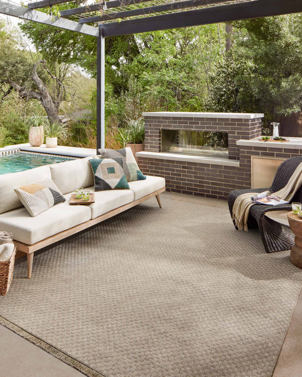 Natural accent rug with subtle geometric pattern, laid flat on the floor
