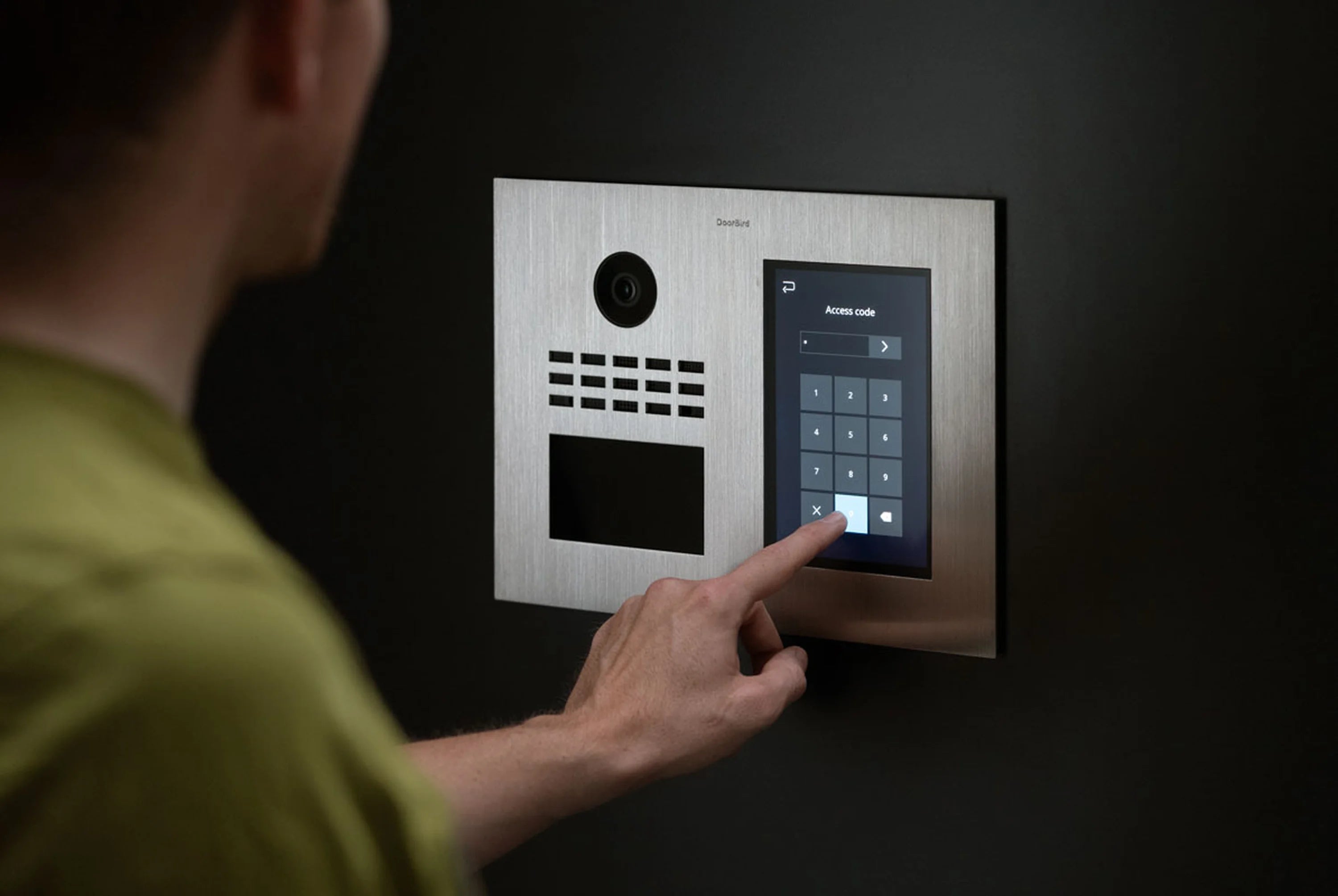DoorBird IP video intercom panel with built-in camera and touchscreen keypad