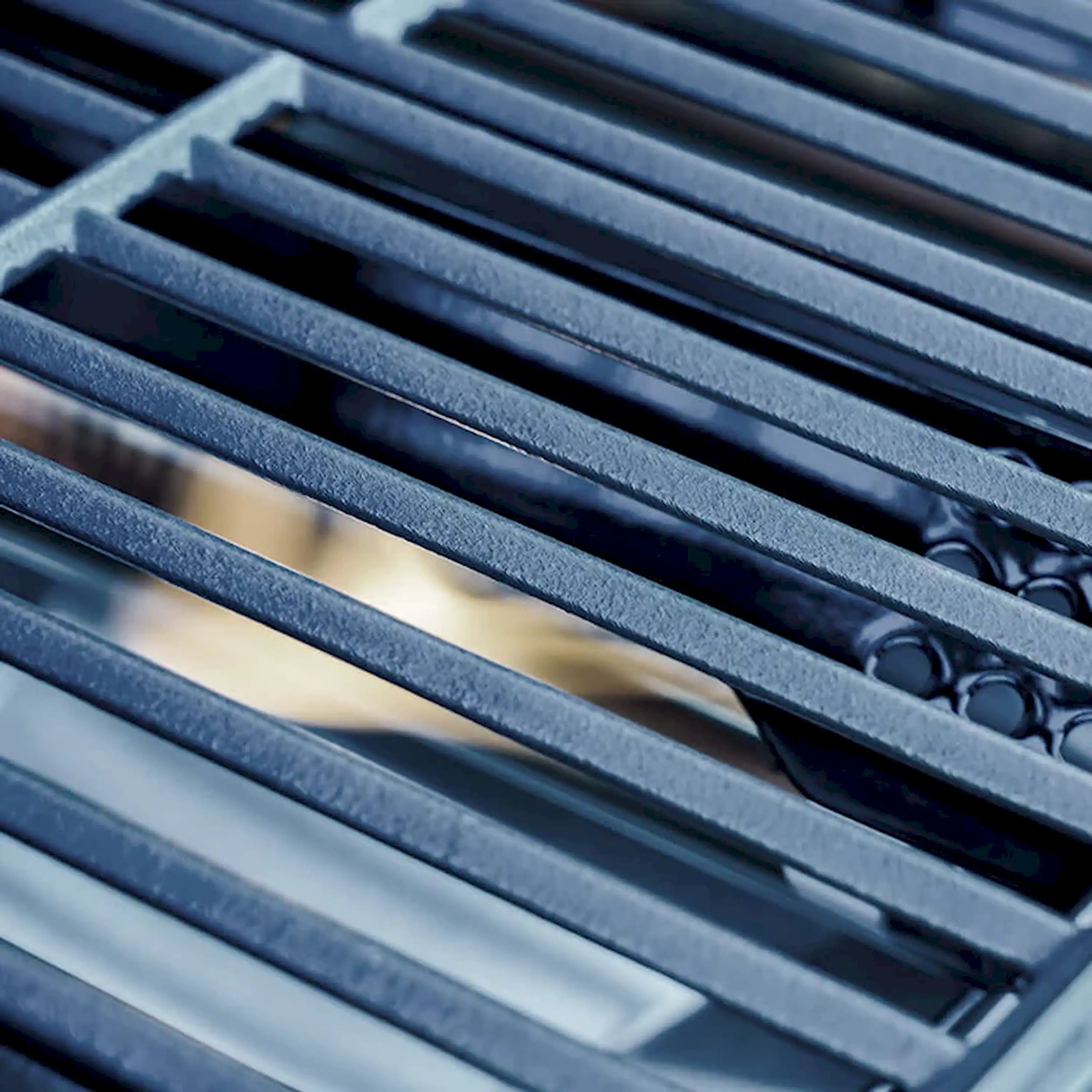 Stainless steel grill cooking grates with dark enamel finish