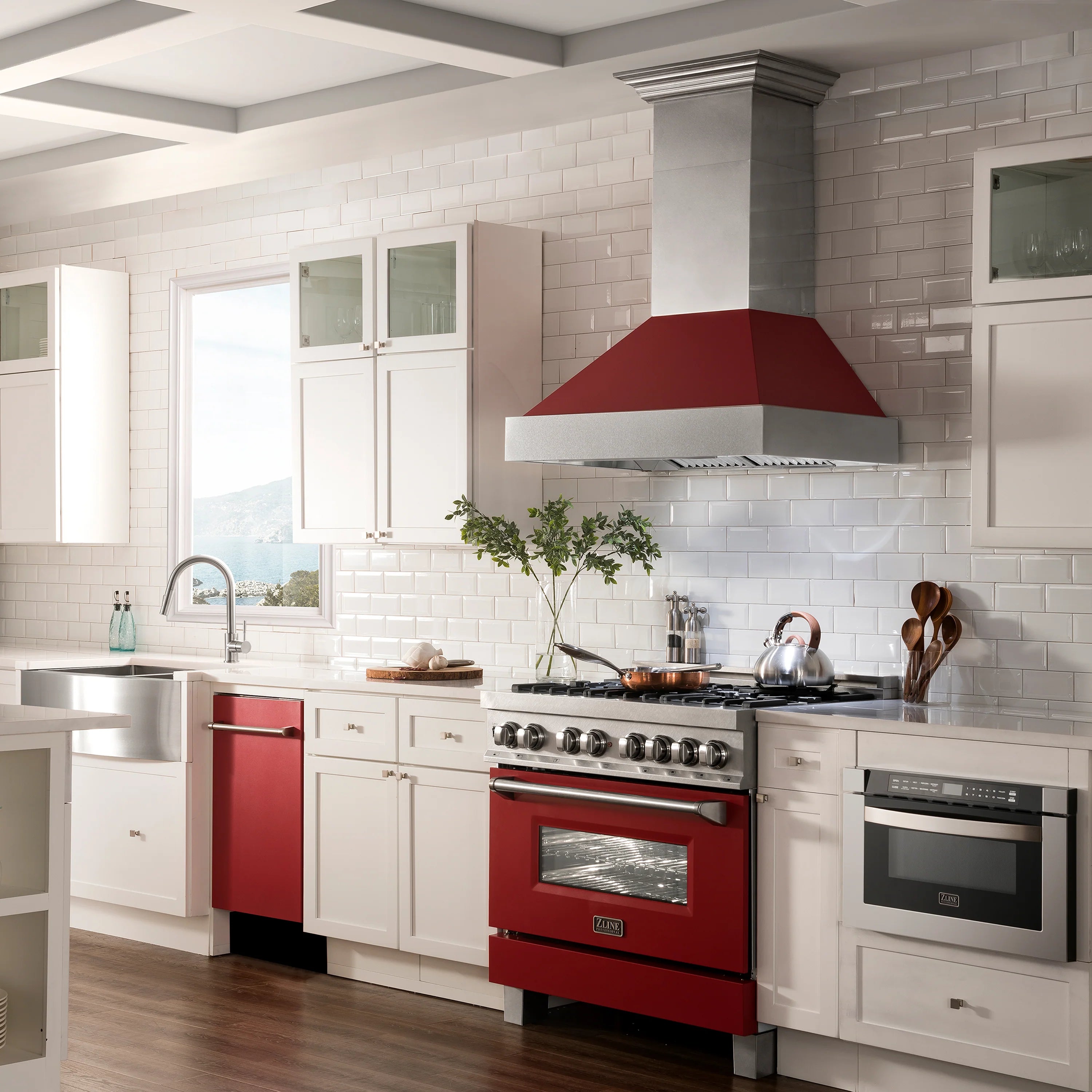 Red matte built-in dishwasher in kitchen with stainless interior and racks