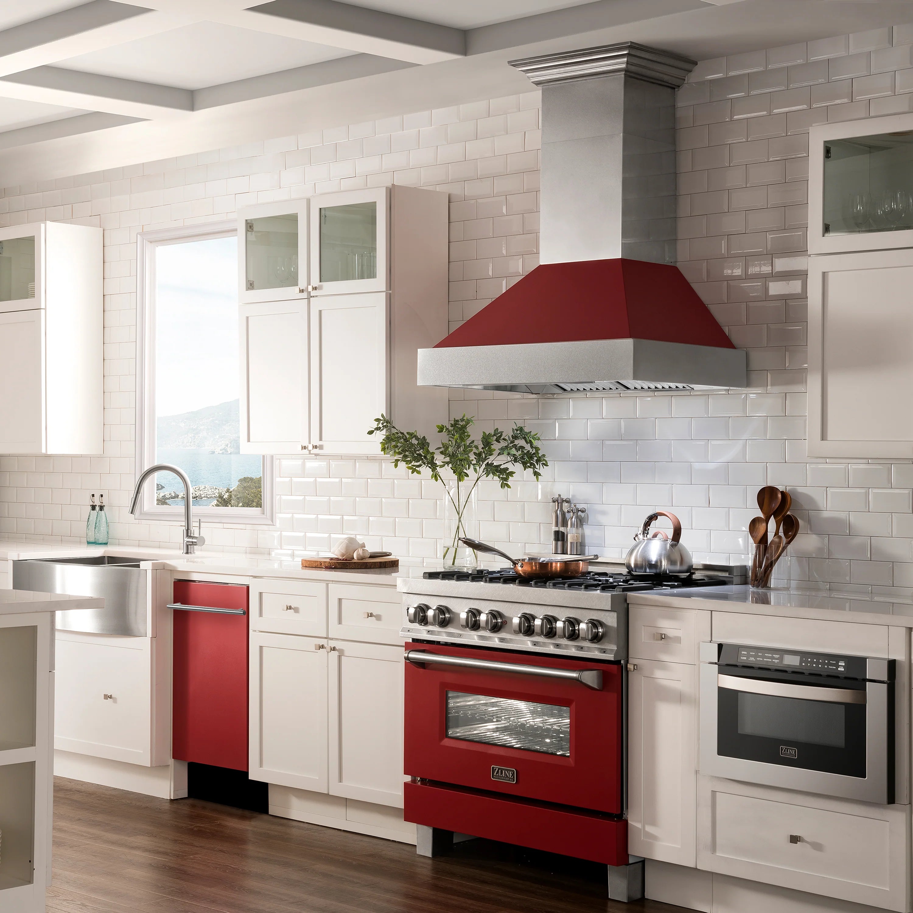 Red matte built-in dishwasher with stainless handle in a modern kitchen setting