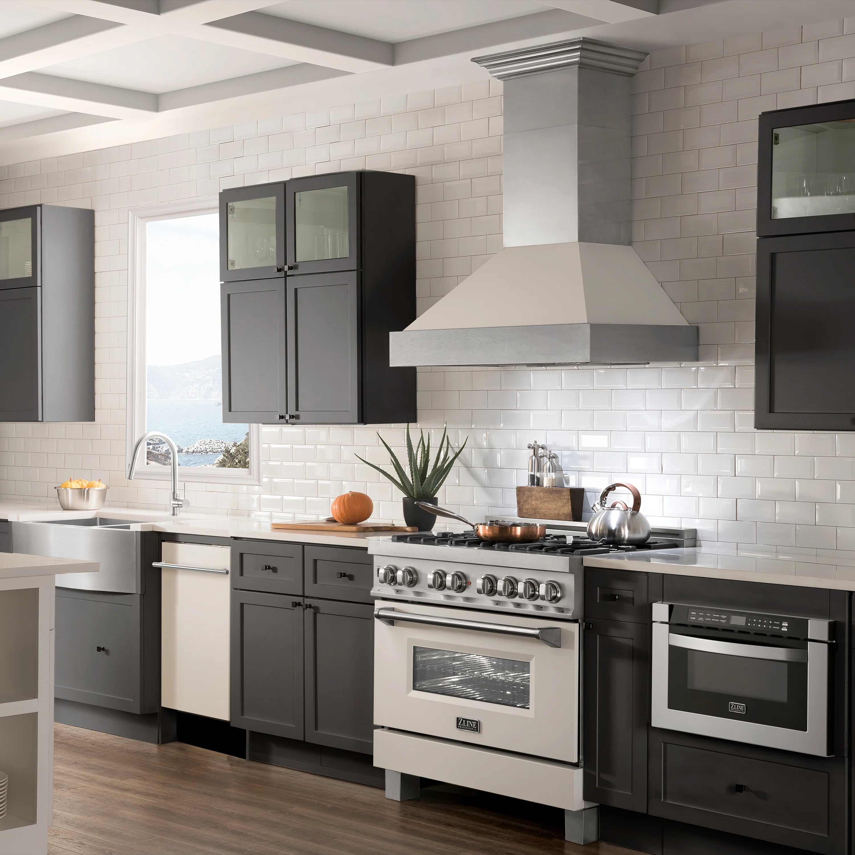 Built-in dishwasher in modern kitchen, white matte door with stainless handle