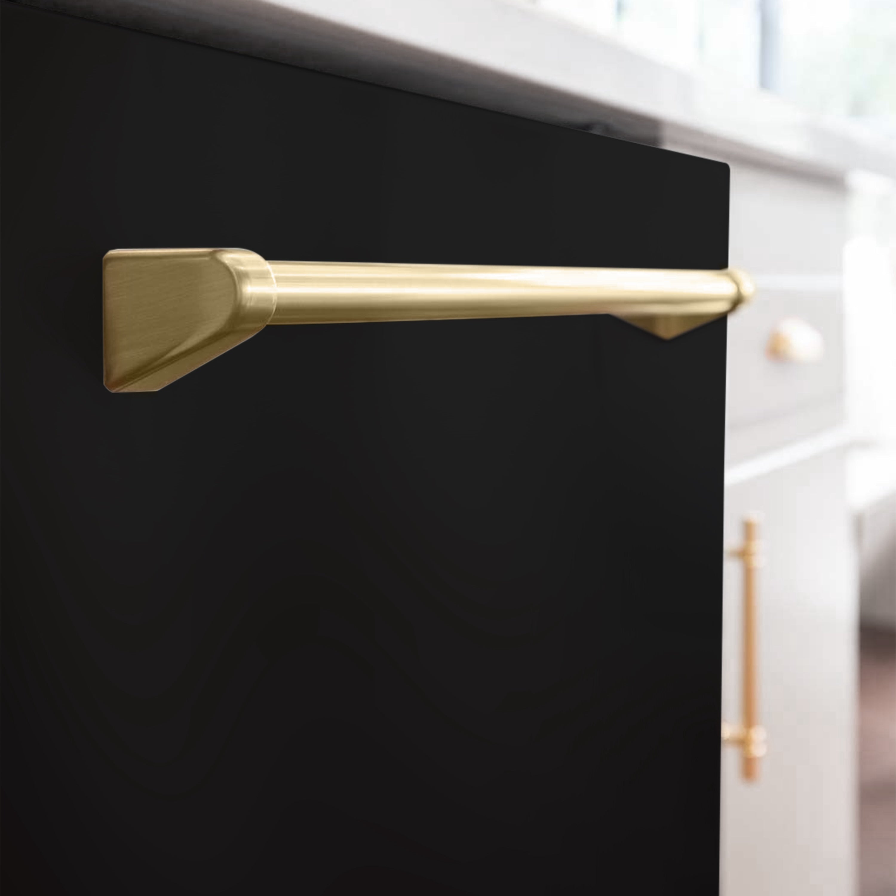 Close-up of matte black dishwasher door with champagne bronze handle