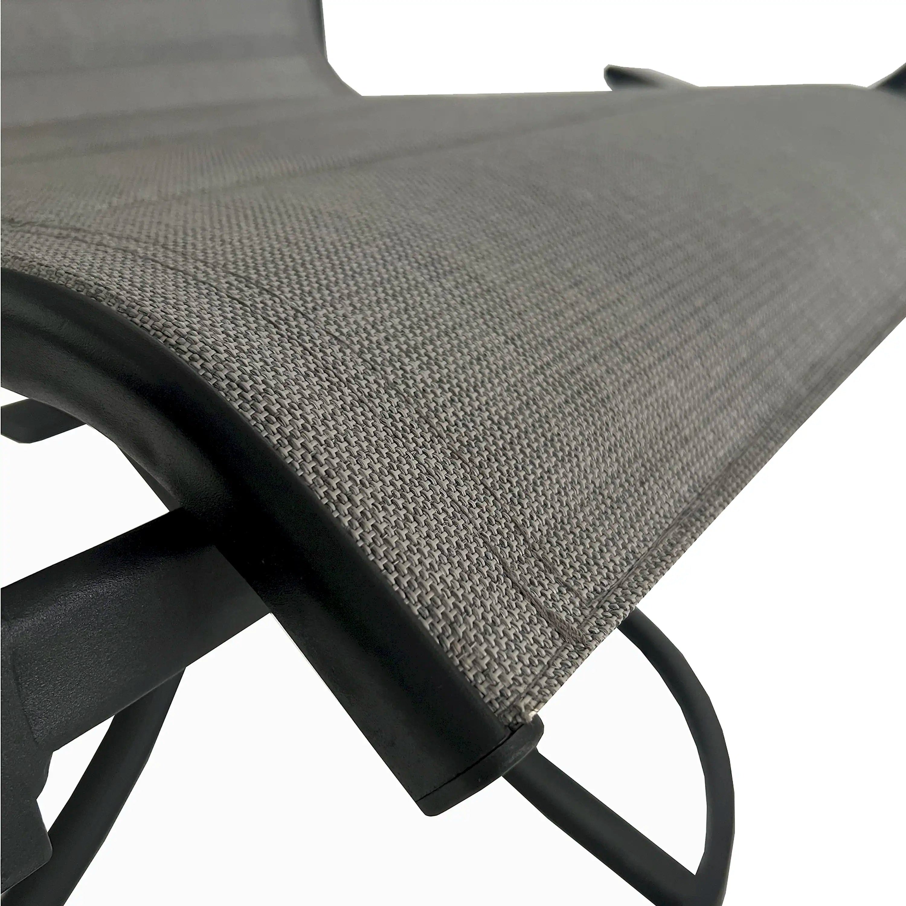 Patio swivel chair seat cushion with gray woven fabric and black armrest.
