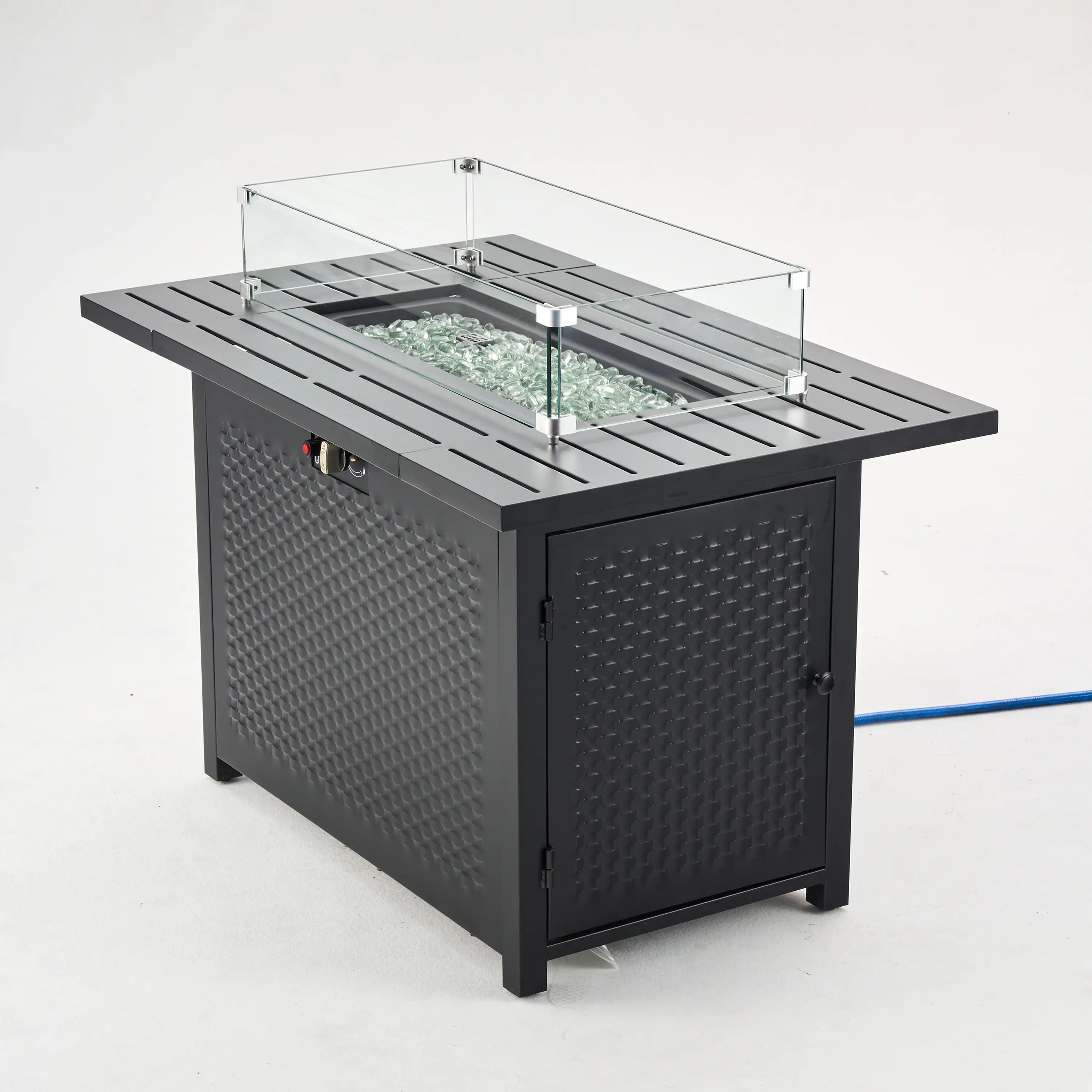 Outdoor propane fire pit table with clear glass wind screen and dark lid