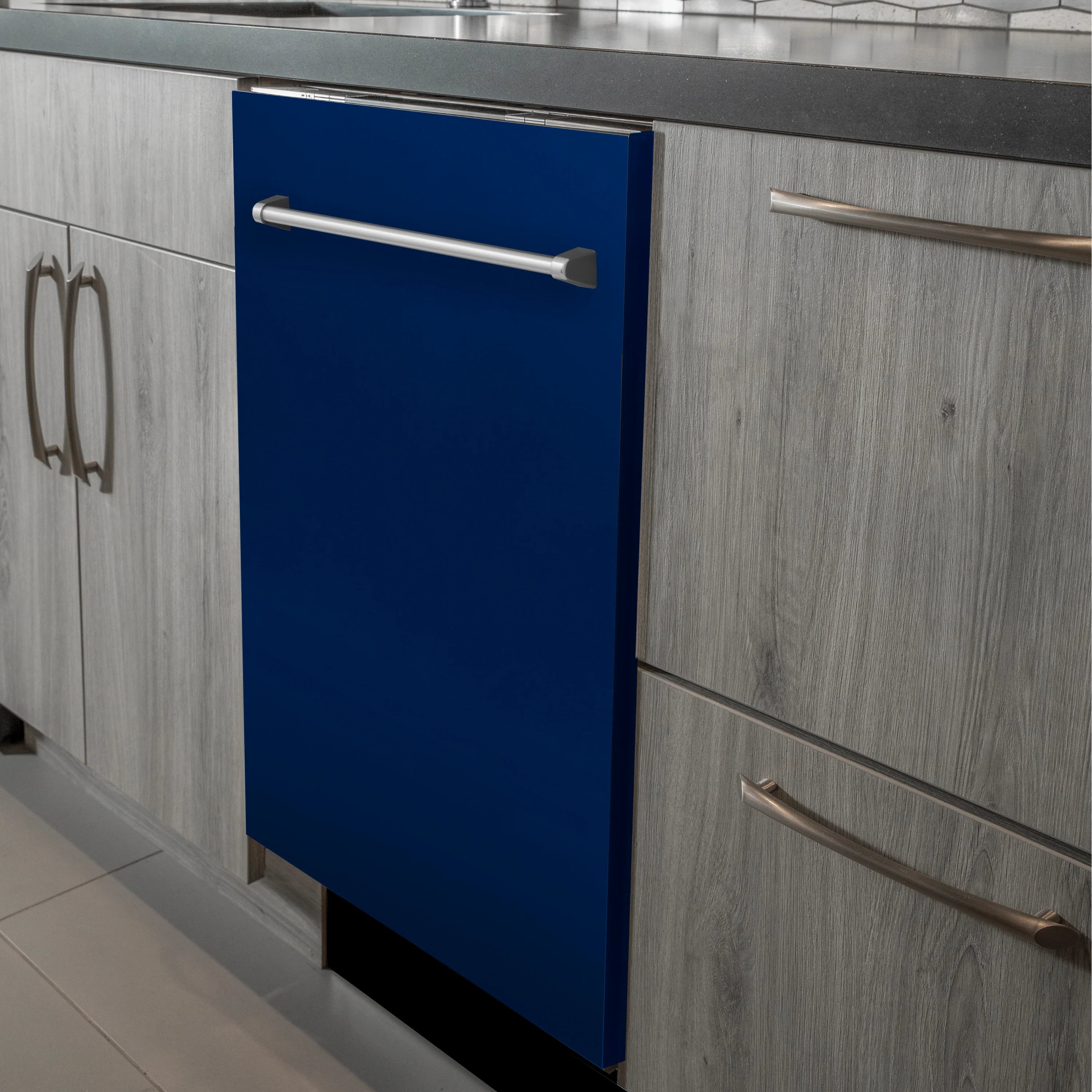 Built-in dishwasher with blue door and stainless traditional pull handle