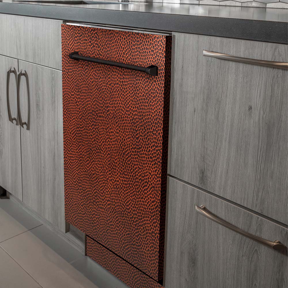 Dishwasher hammered copper front panel with recessed handle.