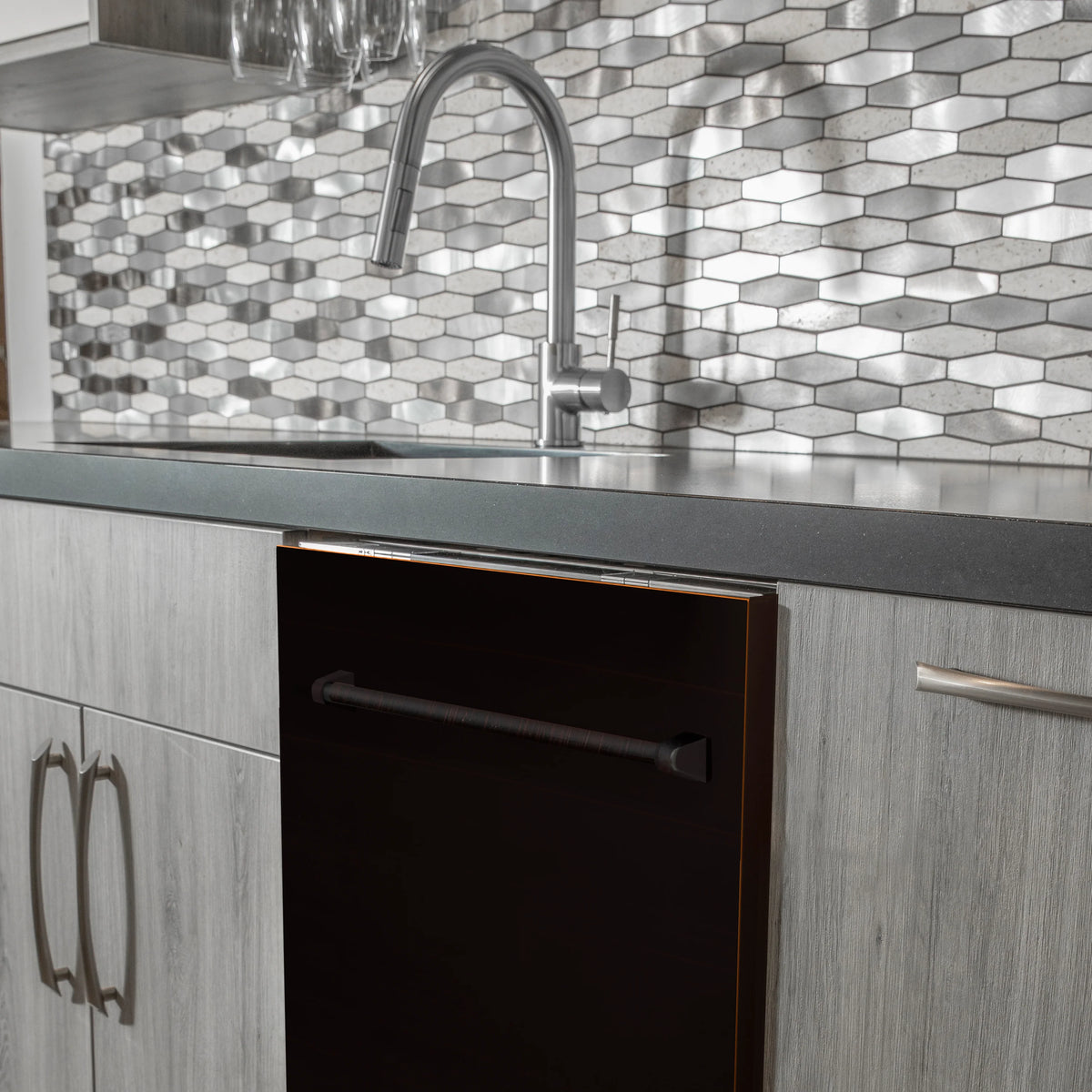 Built-in dishwasher door with oil-rubbed bronze finish and long handle pull