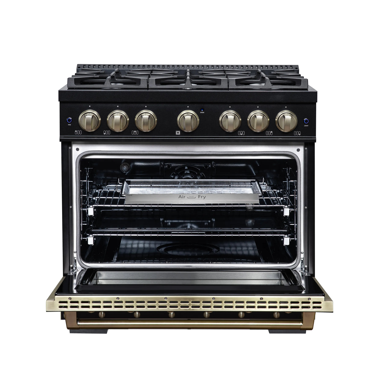Black dual fuel range with oven door open, racks inside, and brass trim