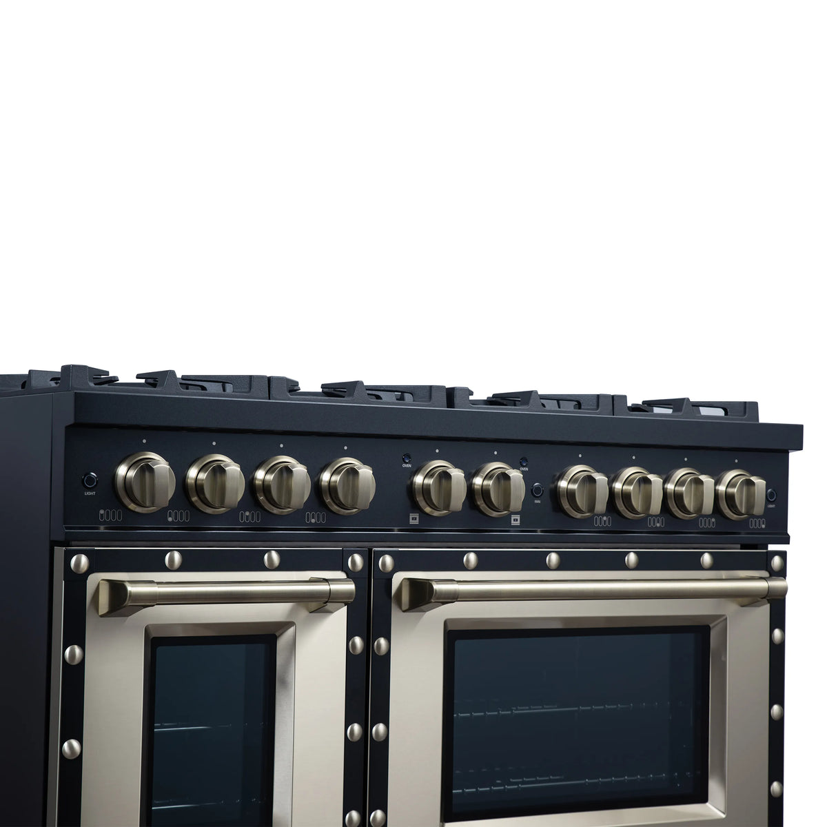 Black dual fuel range control panel with brass knobs and two oven doors with handles