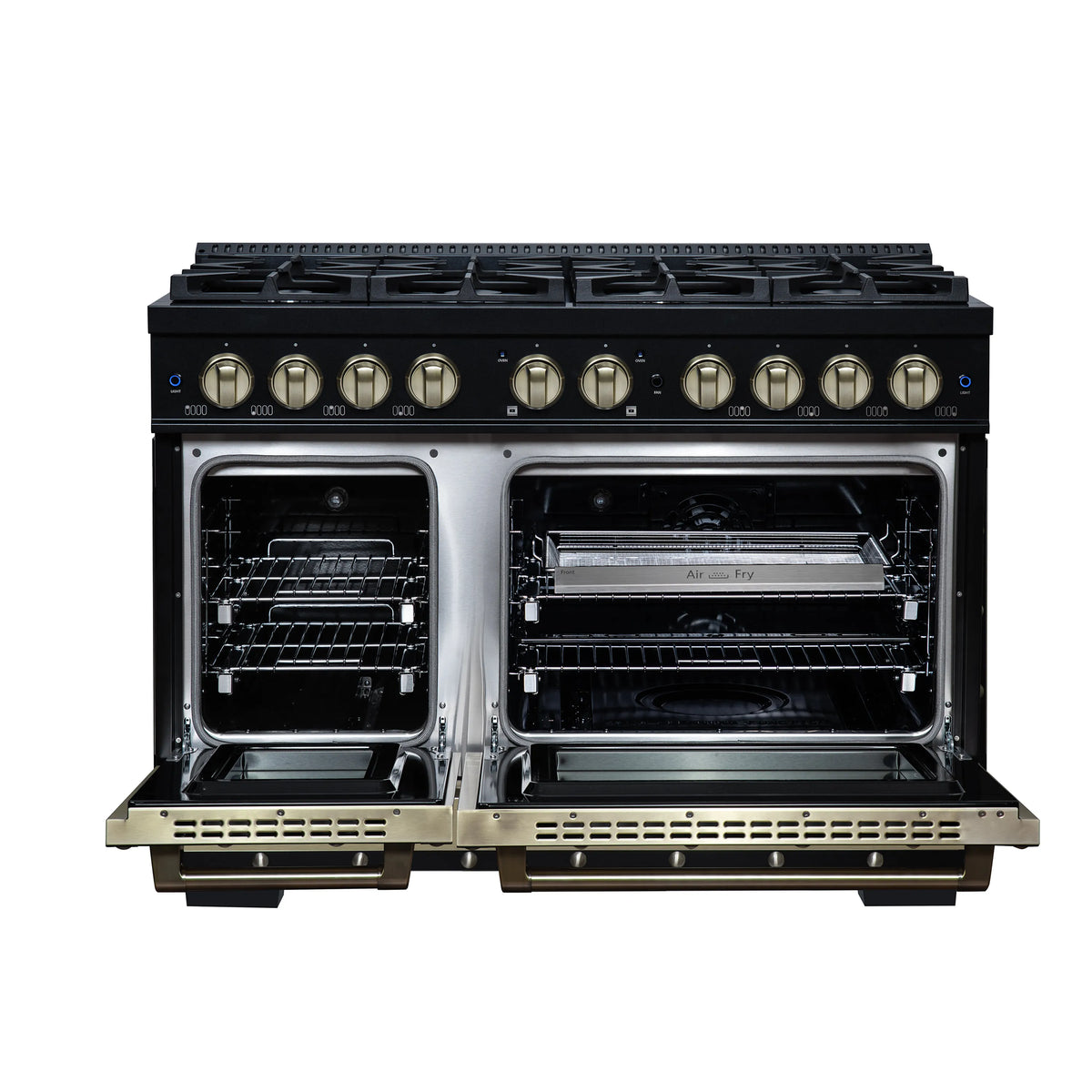 Black dual-fuel range with open dual ovens, brass knobs, and copper trim on doors