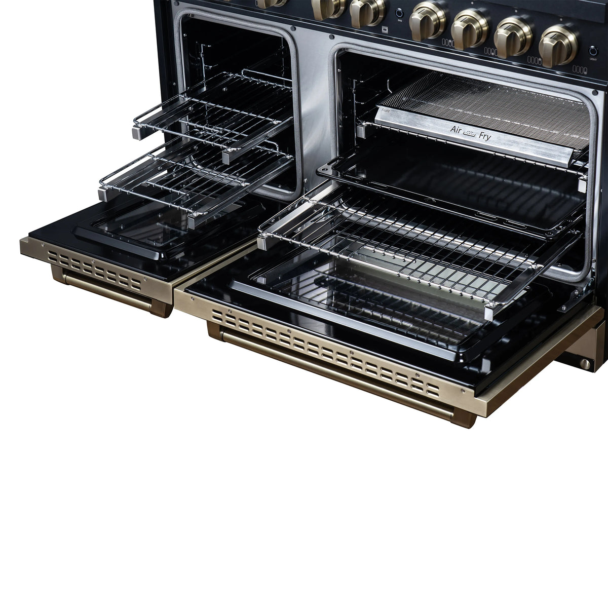 Black dual fuel range with two open ovens and wire racks, antique brass trim and handles