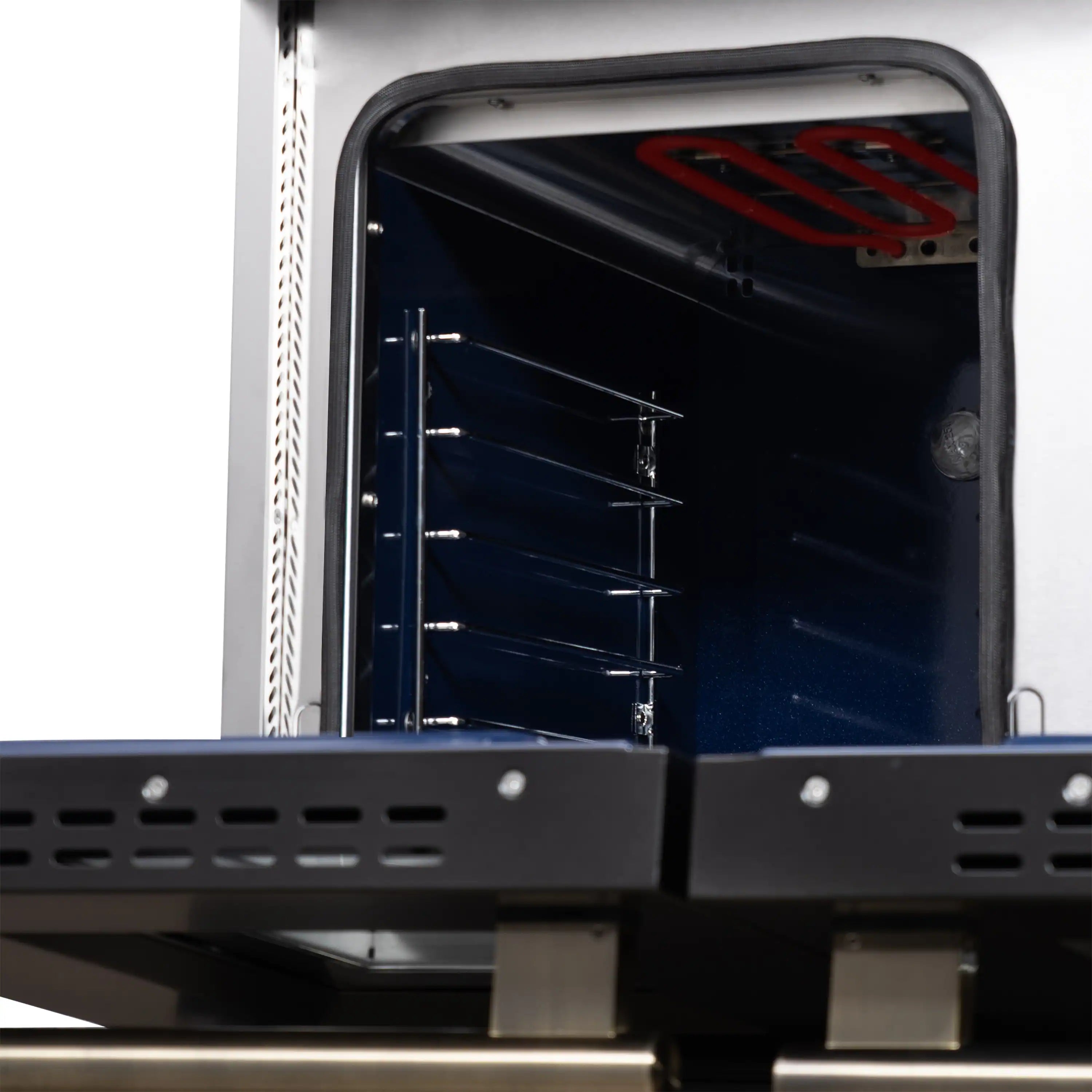 Open convection oven showing dark racks and red heating element inside
