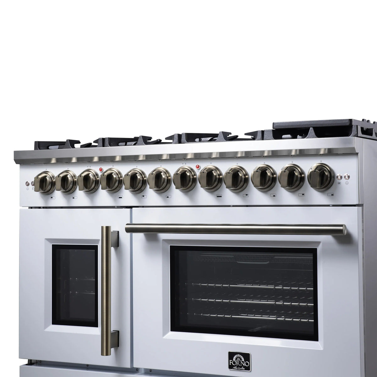 French door dual fuel range with brass handle and control knobs along top