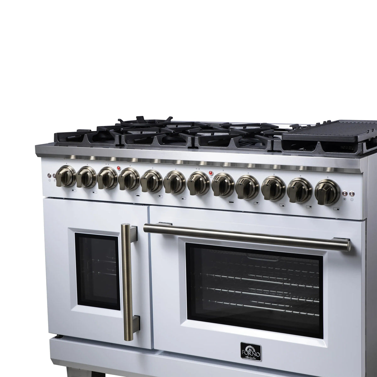 Freestanding range with French oven doors, brass vertical handle, and control knobs
