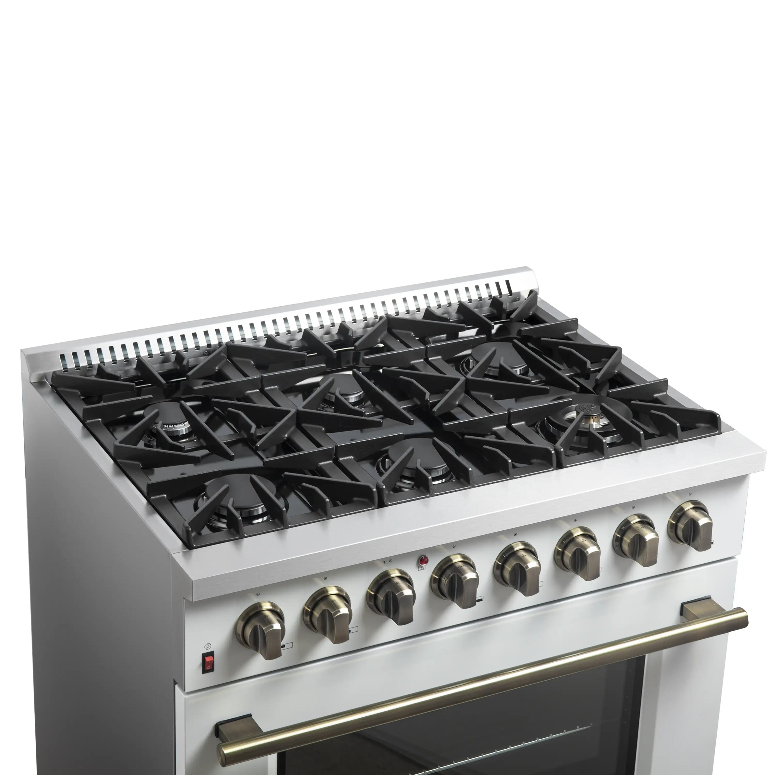 White dual fuel range with black grates, brass handle, and burner control knobs