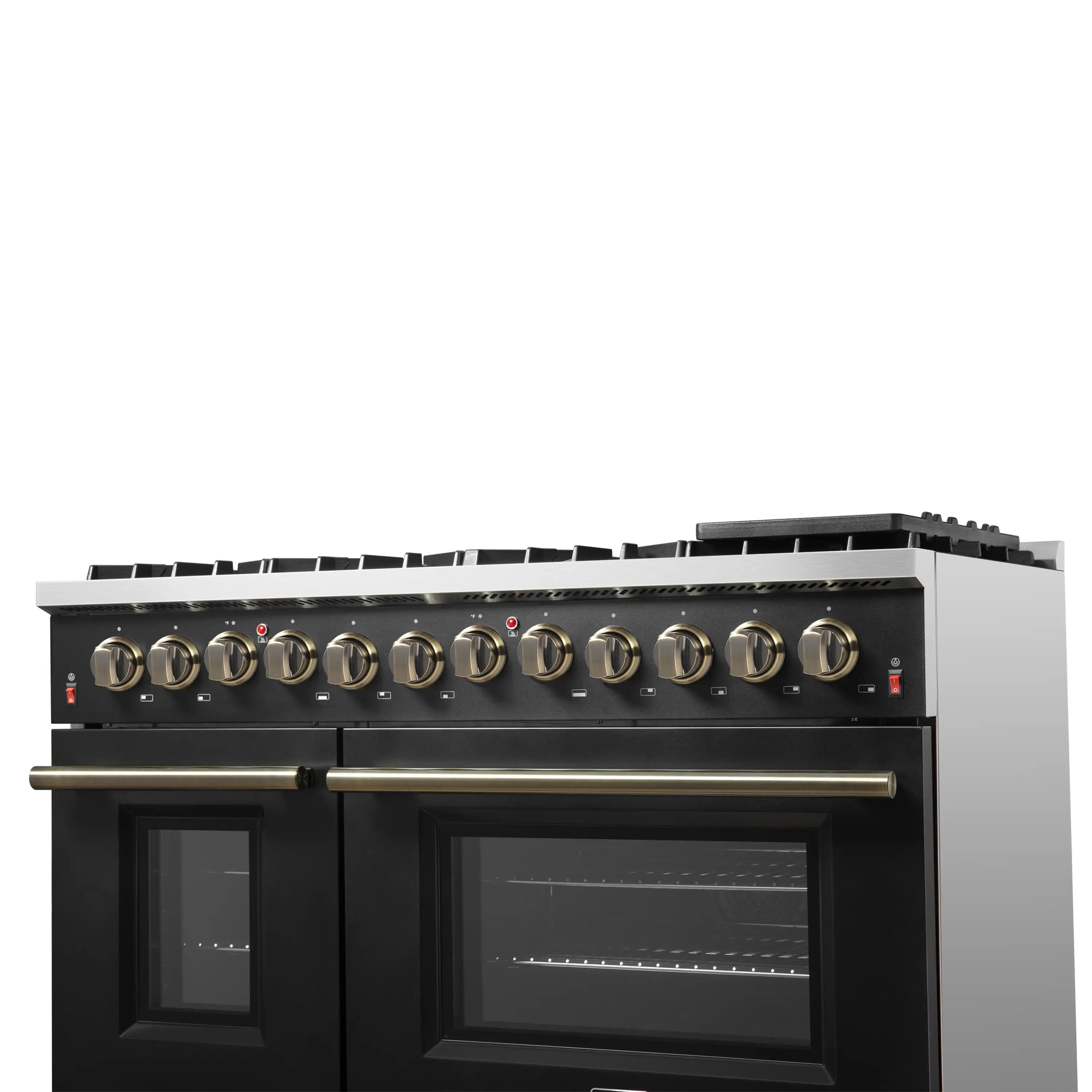 Black dual-fuel range front with antique brass trim bar and glass oven doors