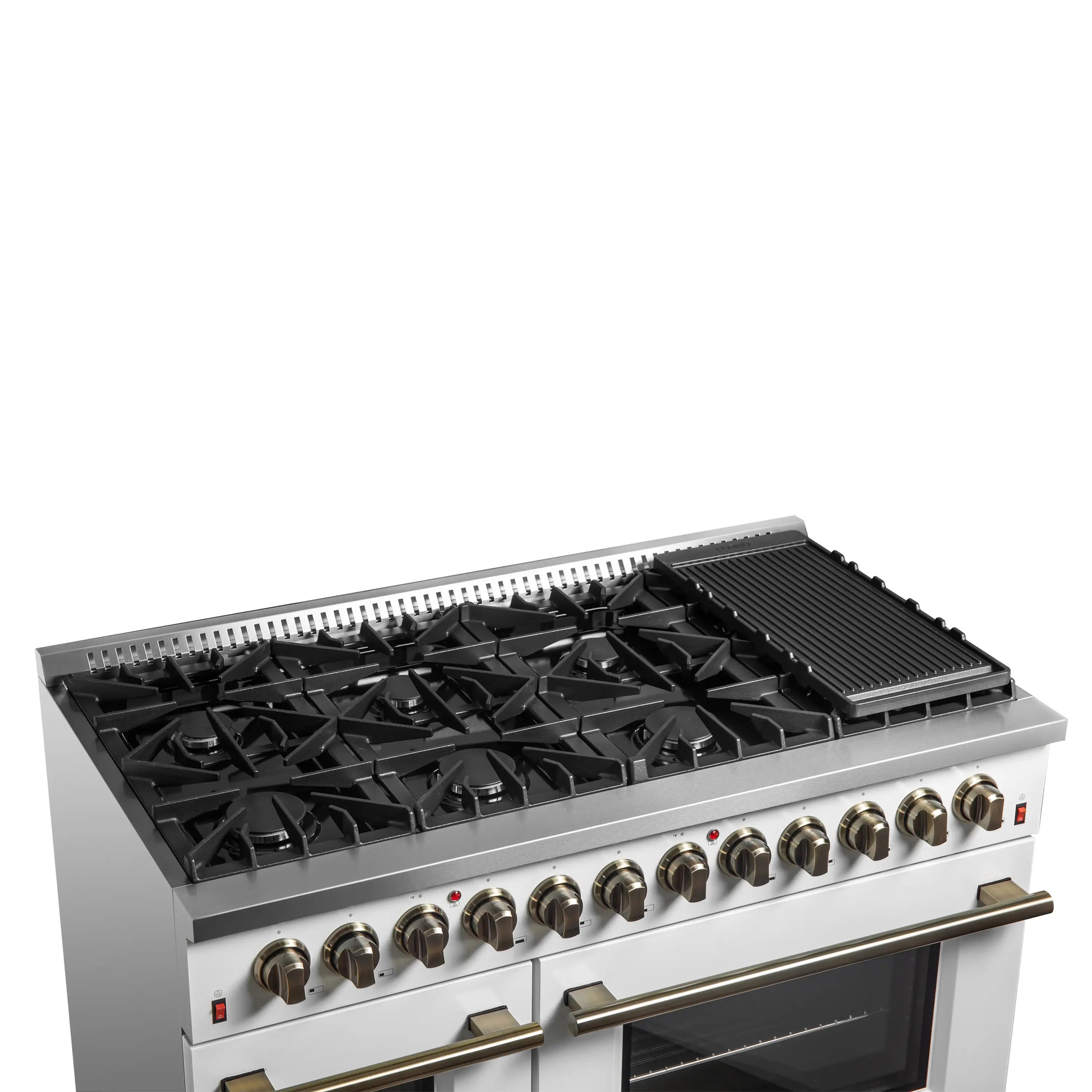White dual fuel range with black cast grates, brass knobs, and front oven door handle