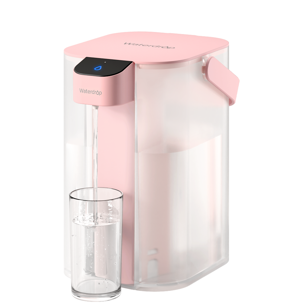 Pink electric water filter dispenser with spout and clear drinking cup