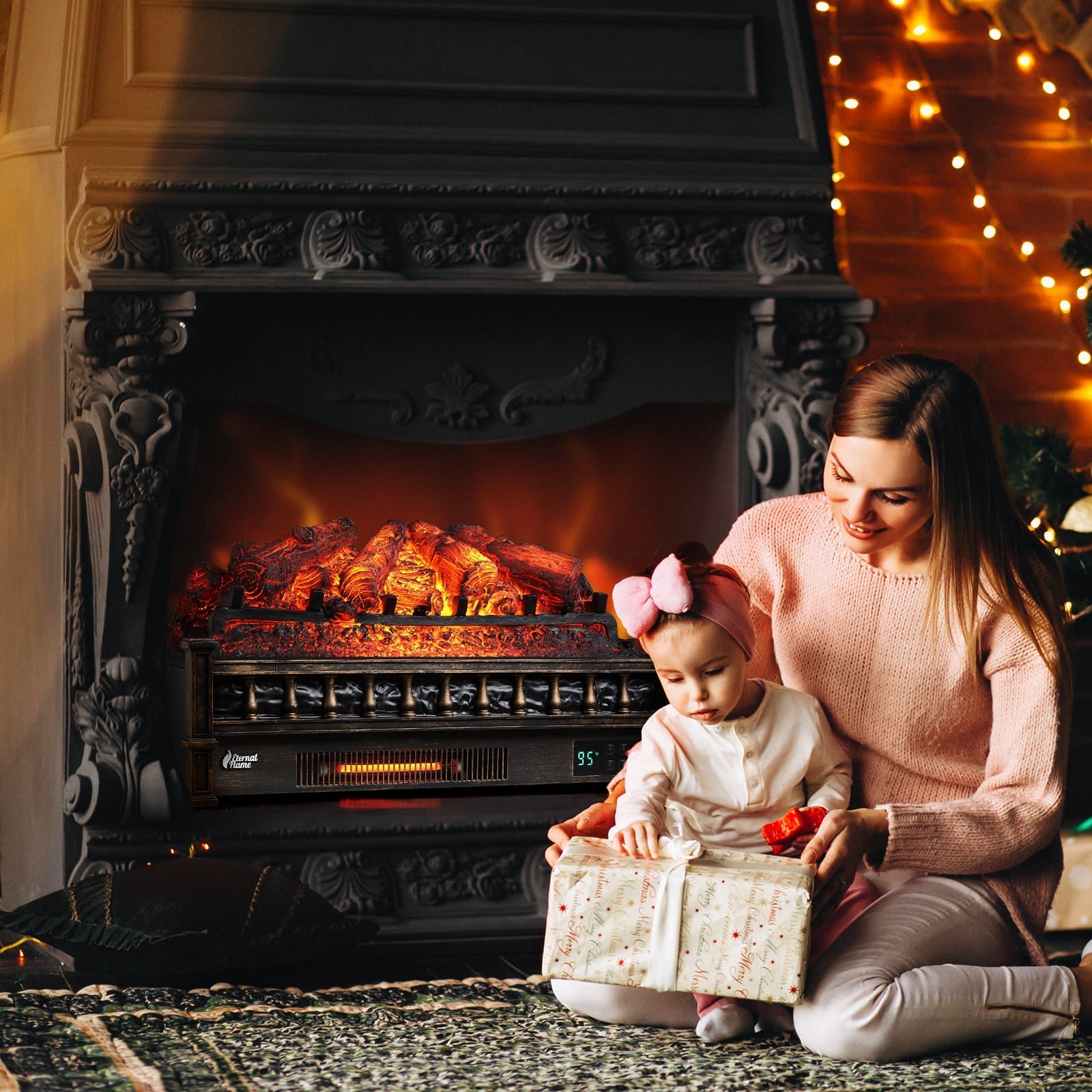 Electric fireplace log set with orange glow and glowing flames, family seated nearby